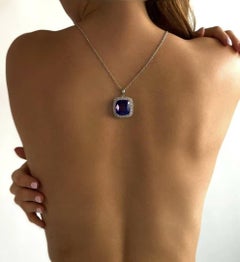 Elegantes pendientes colgantes de tanzanita y diamante en oro blanco de 18k para ella