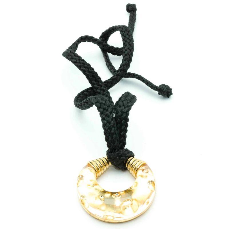 Very nice pendant Christian Dior Dolce Vita 1993, gold plated metal and translucid resin, ajustable black string, can be worn long or short.

Signature: Christian Dior 1993
Dimensions: 62 L cm  , pendant diameter: 6 cm 
Condition: Excellent
