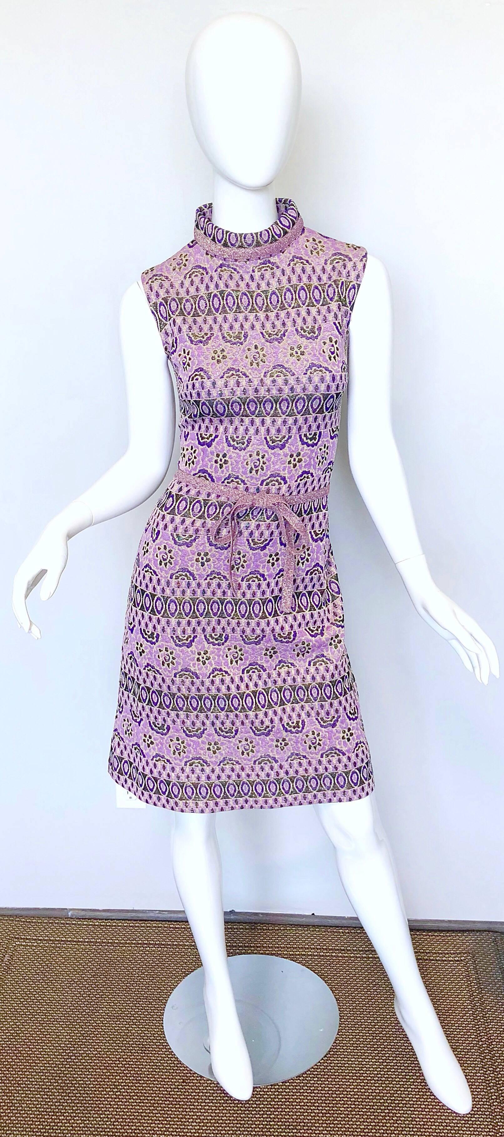 Chic 1960s TRICOSA light, medium, dark purple and gold metallic lurex jersey A-Line dress! Features abstract and flower prints throughout. Detachable matching belt. Hidden metal zipper up the back with hook-and-eye closures. Flattering high mock