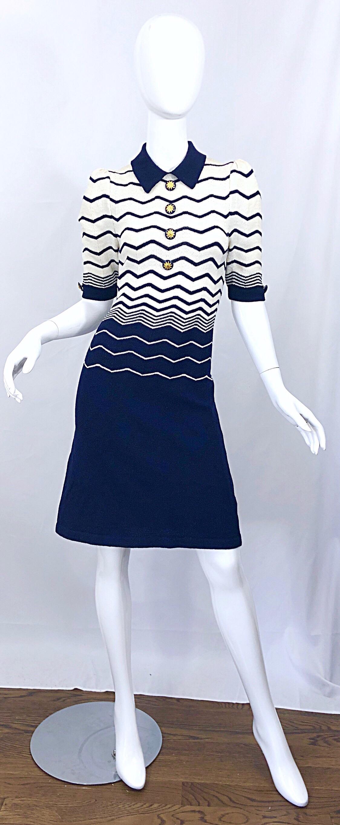 Chic vintage 80s ADOLFO for SAKS 5TH AVENUE navy blue and white zig zag print short sleeve knit dress! Features a fitted bodice with lots of stretch and a forgiving skirt. Mock gold buttons up the front and at each sleeve cuff. Hidden zipper up the