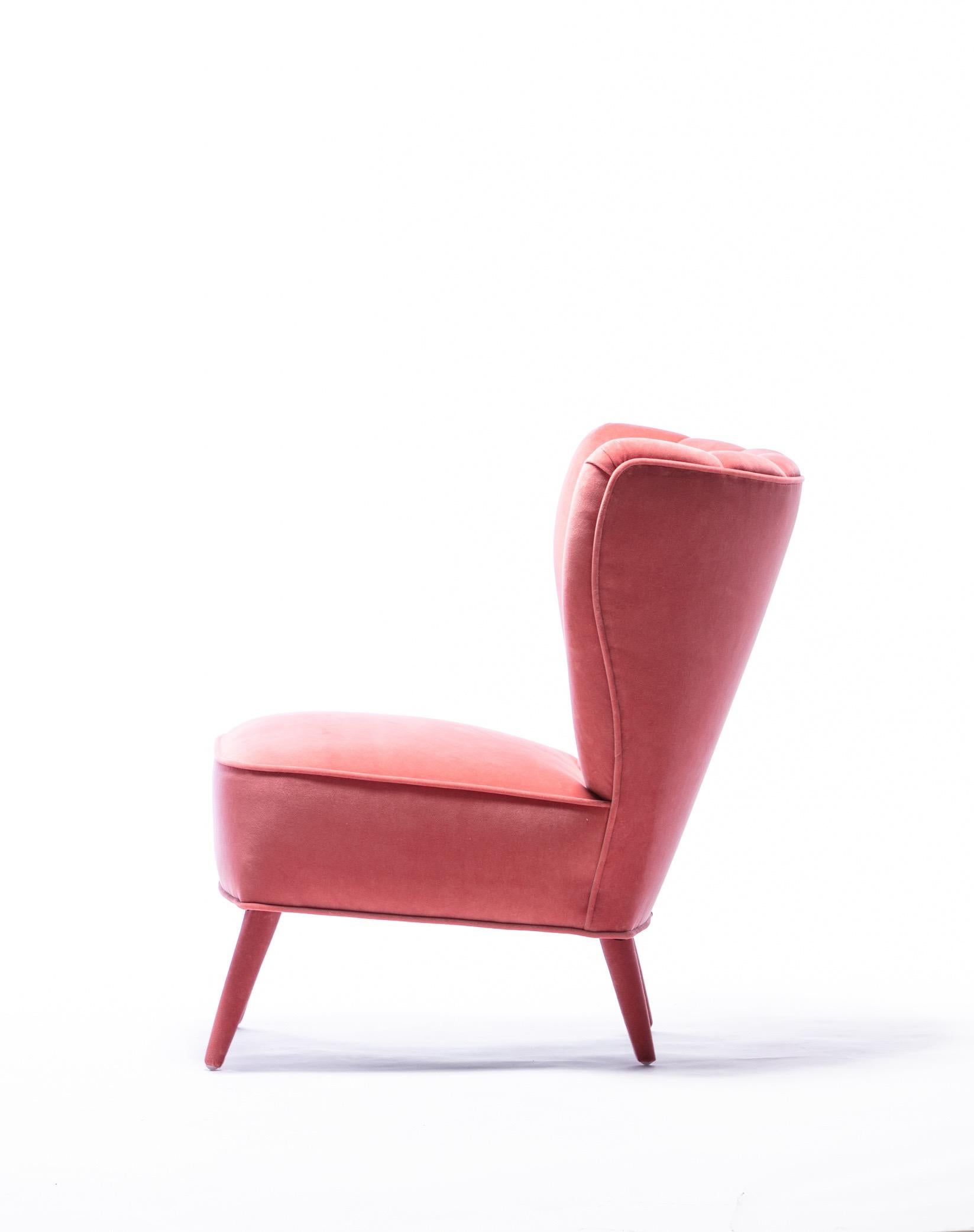 Elegant and chic vintage Italian rose pink colored velvet slipper chair. We admit to drawing some inspiration from the slipper chairs in Gucci stores when we selected the upholstery and details on recovering this vintage Italian slipper chair. The