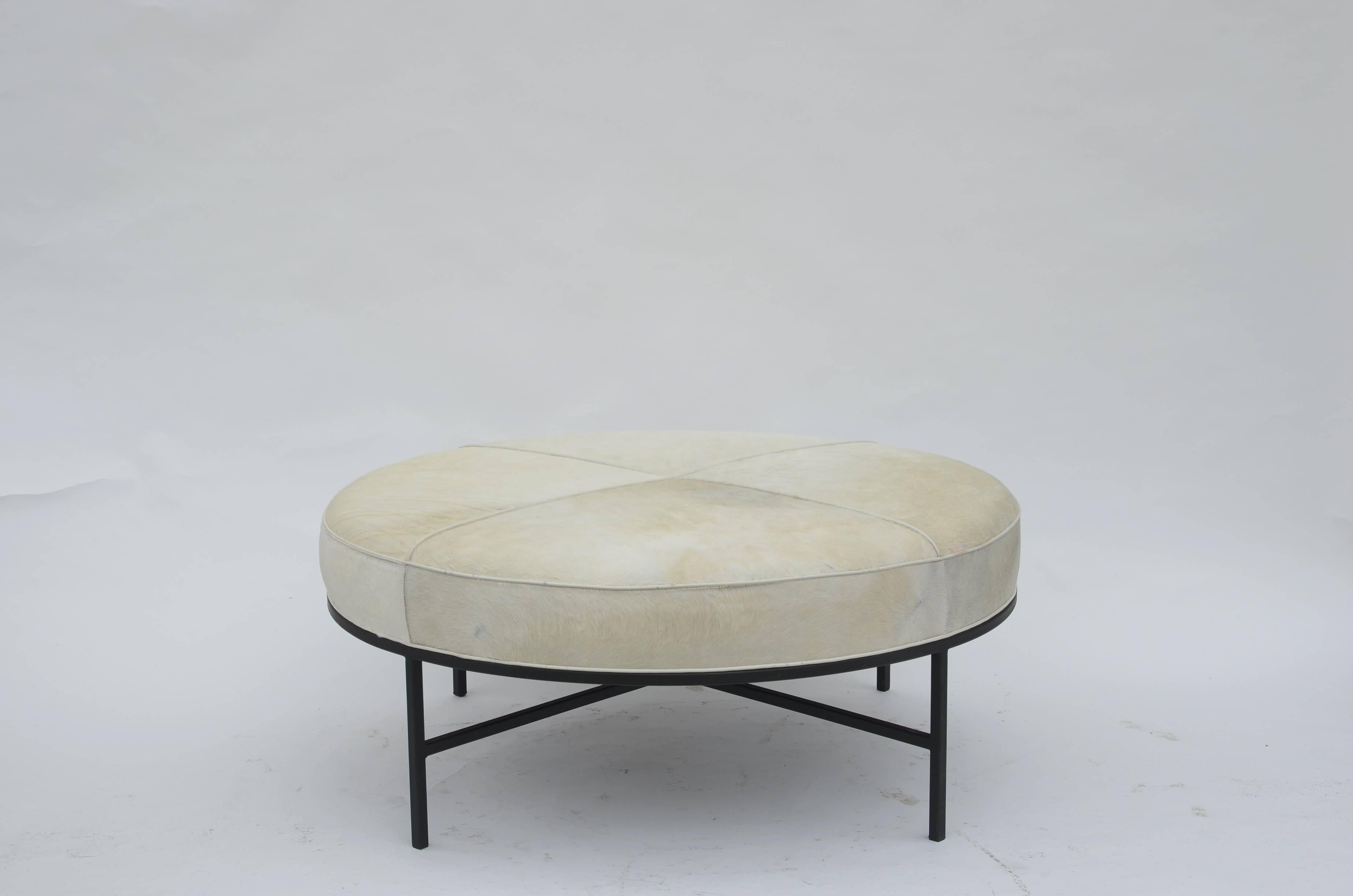 The Tambour ottoman is a welcome change from the traditional coffee table. This inviting, versatile piece can be used to sit, relax, but also as a regular coffee table: Just add a large platter for drinks and you're ready to go. It is upholstered
