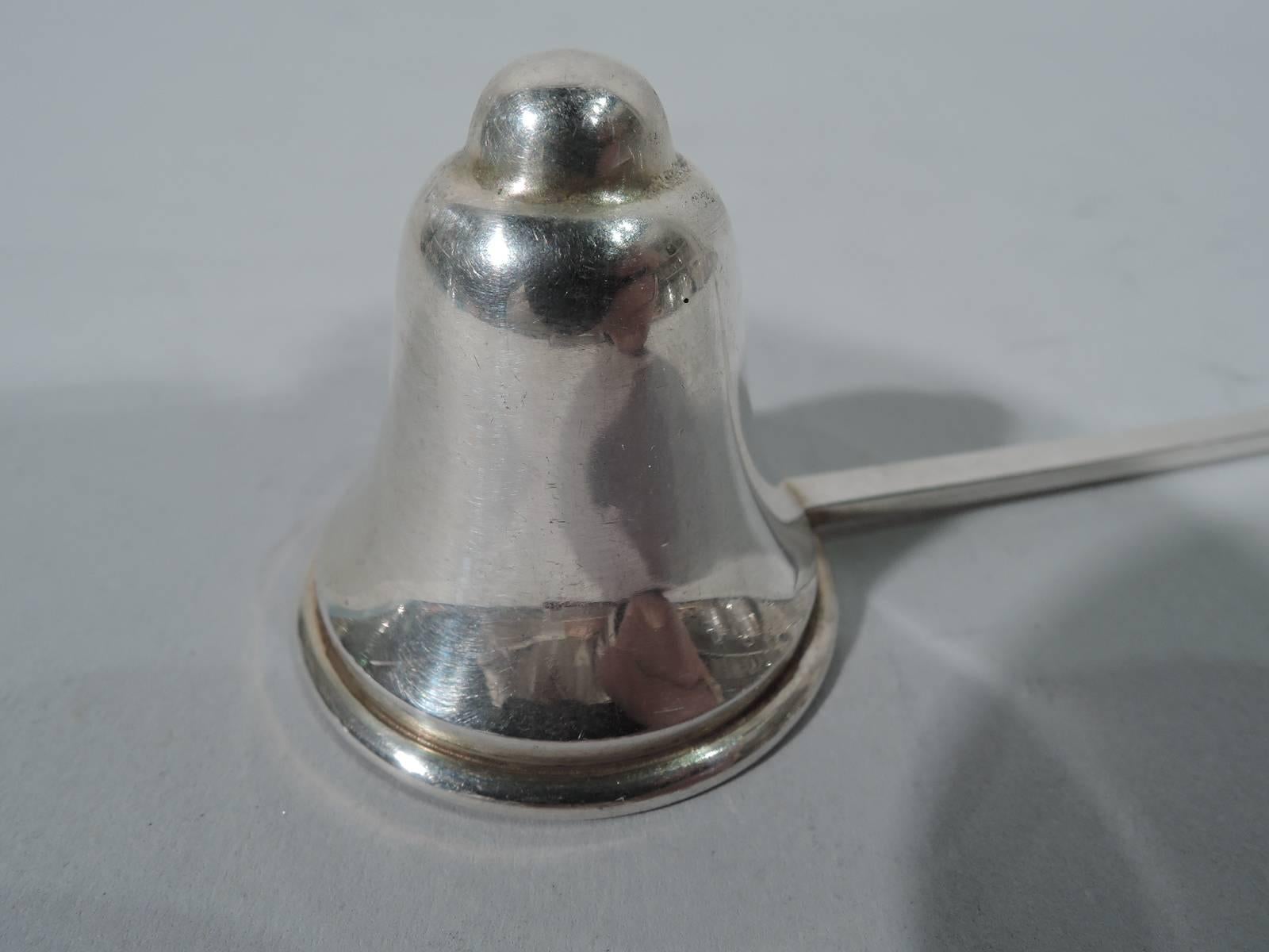 Craftsman sterling silver candle snuffer. Made by The Randahl Shop in Chicago. Domed bell bowl and straight flat handle with loop terminal. Hallmarked.
