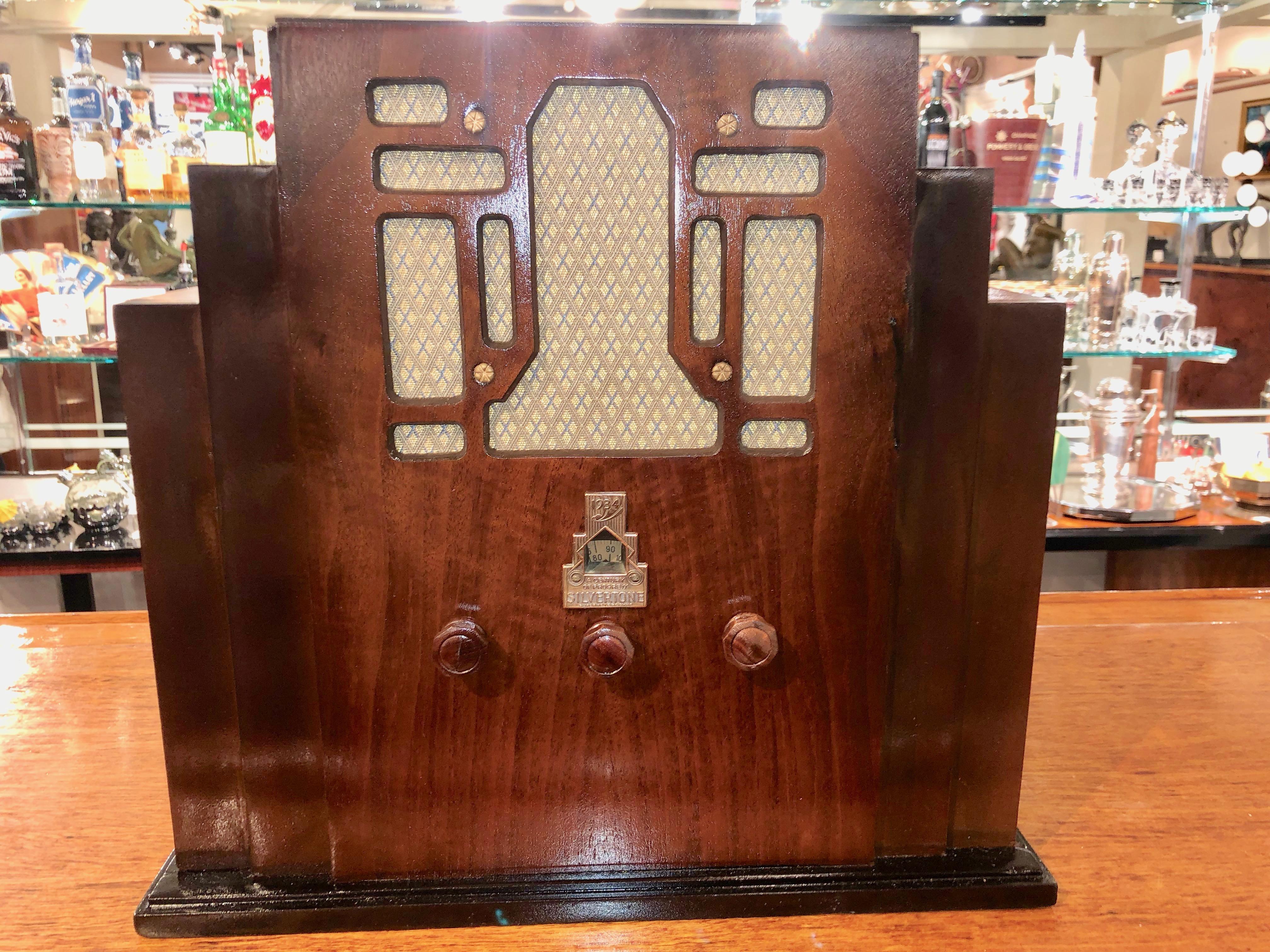 Original Skyscraper Chicago Worlds Fair clock cabinet. Restored cabinet with original metal Silvertone front plate. Stepped design is unique from the period and a very rare piece. We have adapted this with a modern bluetooth speaker, which allows