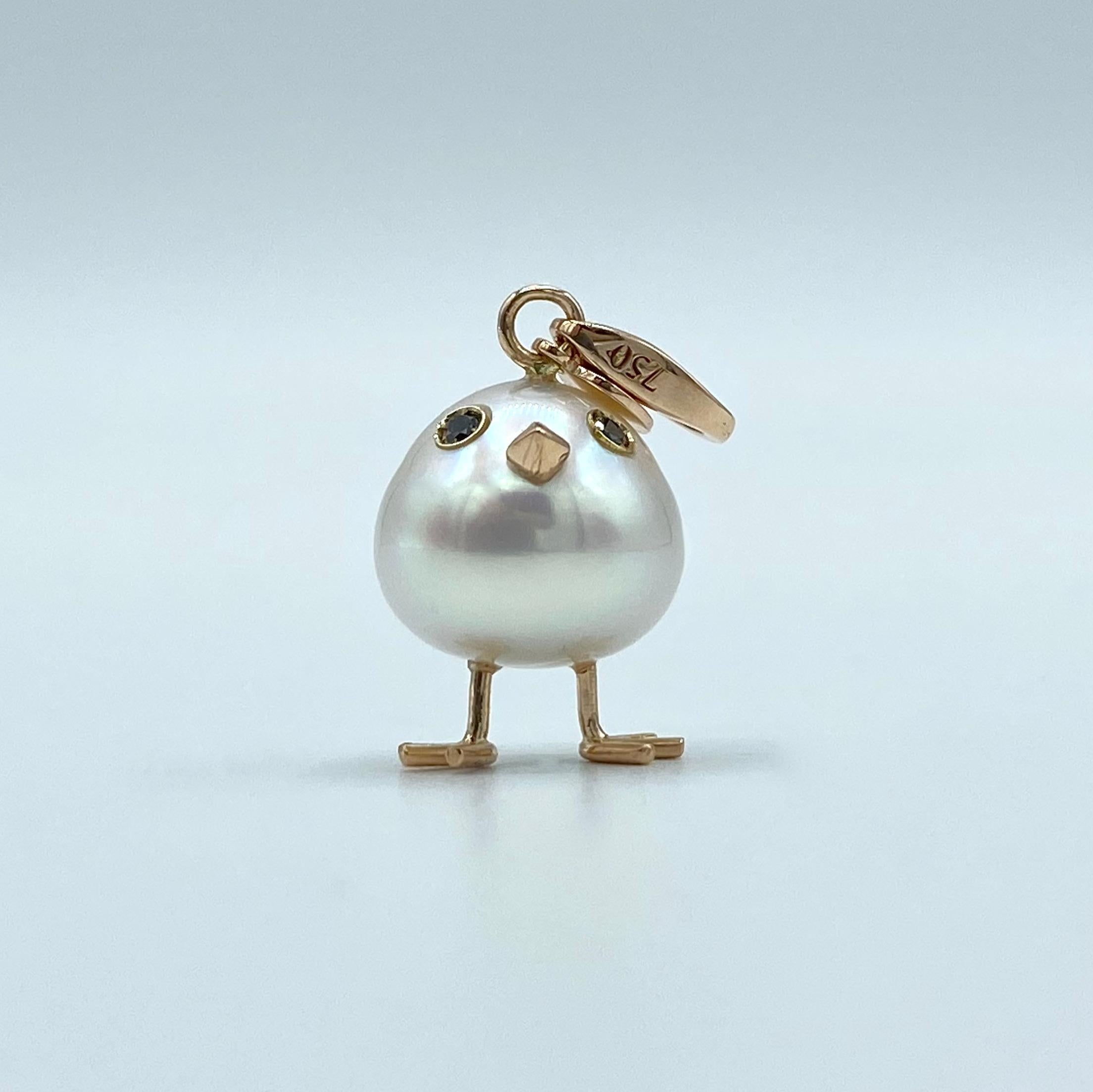 Chick Gold Pearl White Diamond 18Kt Gold Pendant Necklace or Charm 
A beautiful Australian pearl has been carefully crafted to make a chick. He has his two legs, two eyes encrusted with two black diamonds and his beak. The ring for the necklace is a