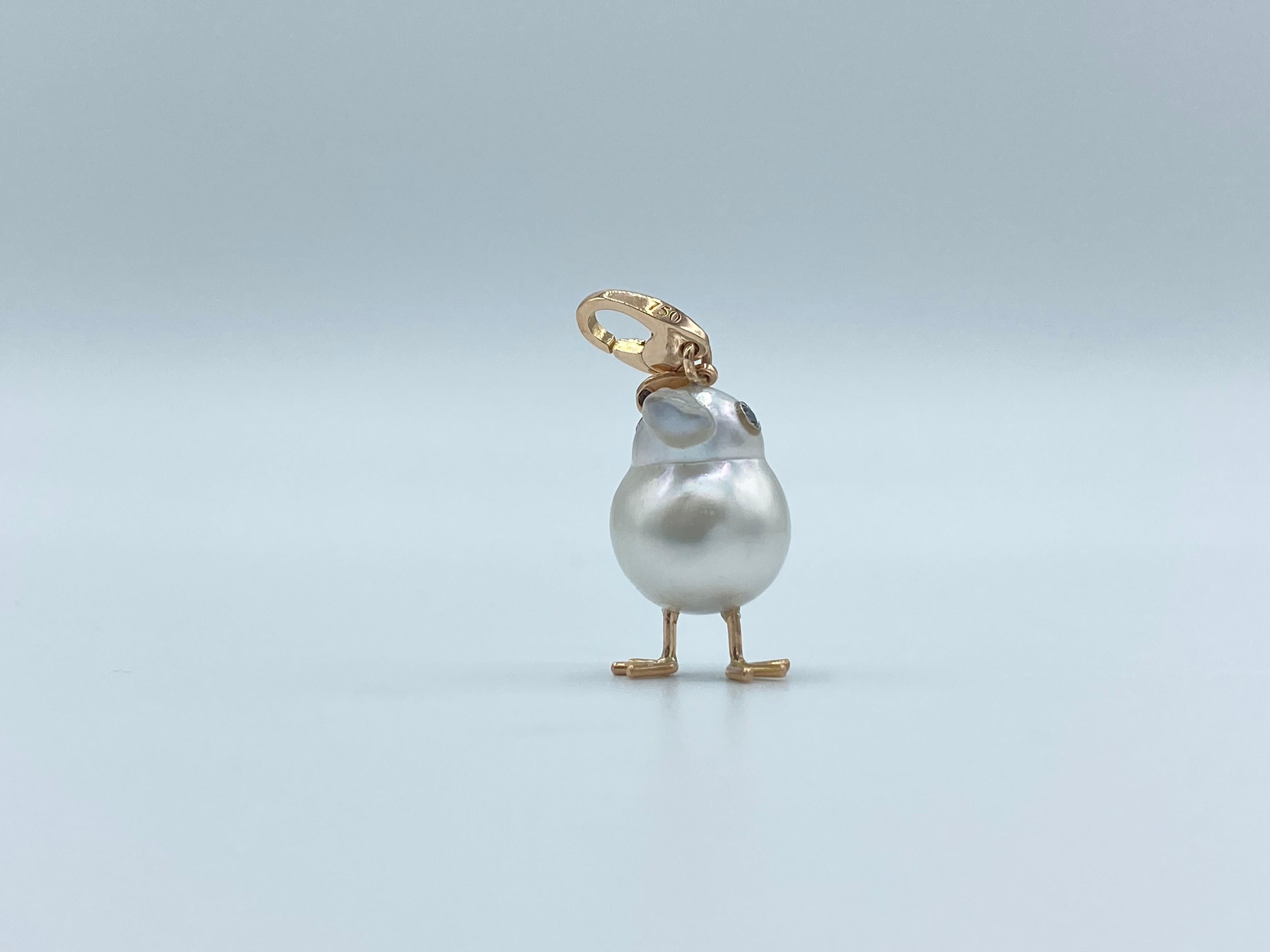 Chick Australian Pearl White Diamond 18Kt Red Gold Pendant Necklace or Charm 
A beautiful yellow Australian pearl has been carefully crafted to make a chick. He has his two legs, two eyes encrusted with two black diamonds. I didn't have to add the