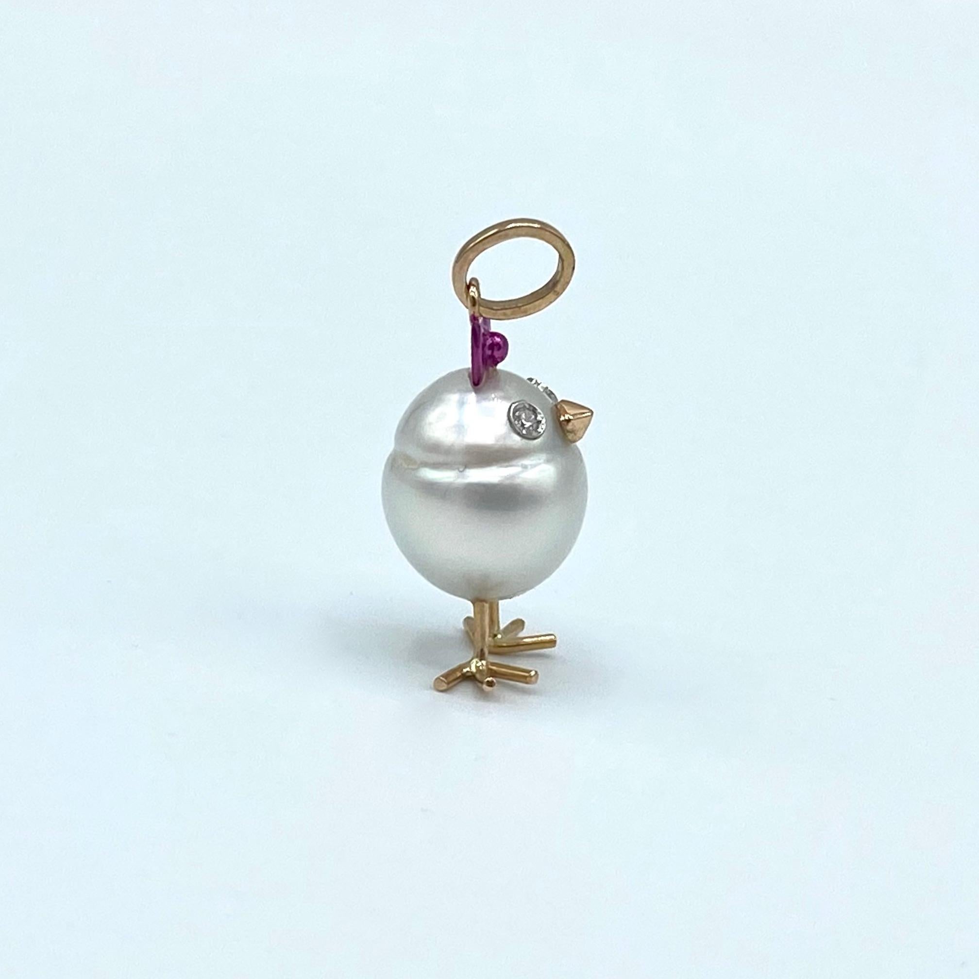 Chick Australian Pearl Diamond Yellow Red white 18 Kt Gold Pendant  Necklace
A very beautiful Australian pearl has been carefully crafted to make a chick. He has his two legs, two eyes encrusted with two white diamonds and his beak. 
The gold is