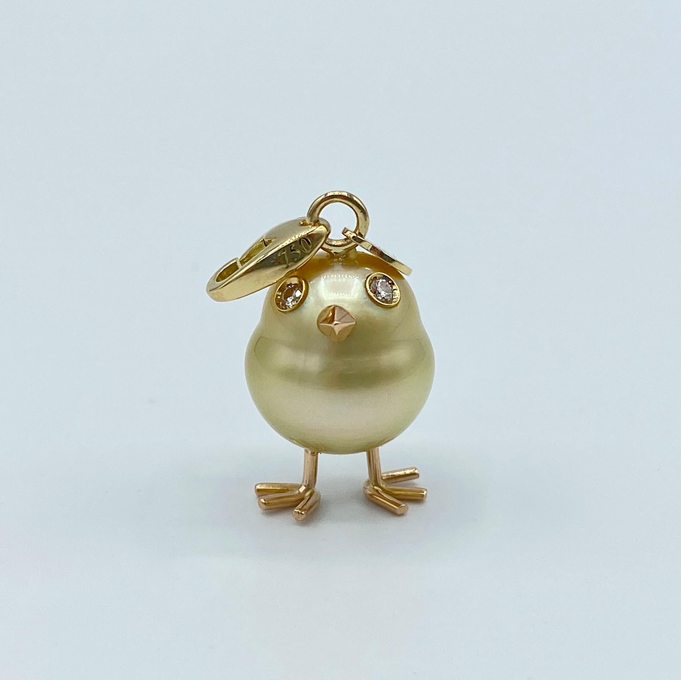 Chick Gold Pearl White Diamond 18Kt Gold Pendant Necklace or Charm 
A beautiful yellow Australian pearl has been carefully crafted to make a chick. He has his two legs, two eyes encrusted with two white diamonds and his red gold beak. The ring for
