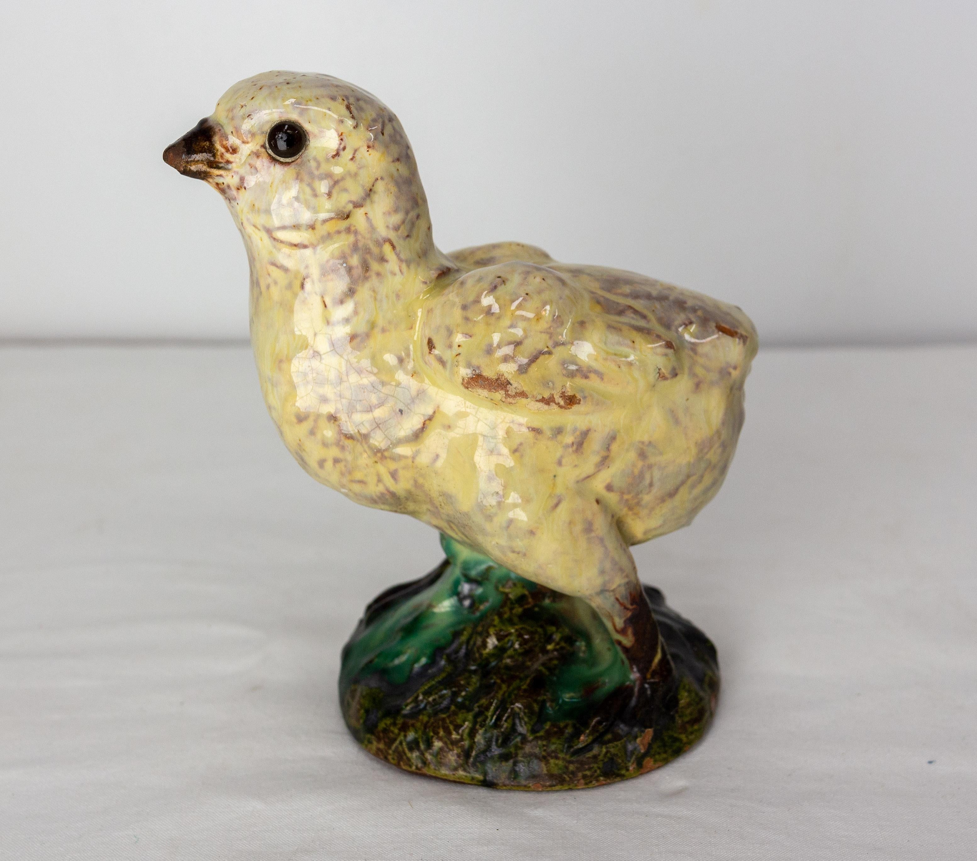 French Terracotta recovered of faience representing a chick
Signed by Joseph Filmont ceramicist in Caen, Normandy. He created at the end of the 19th century a pottery and architectural ceramics in his hometown.
Good condition, small age changes on