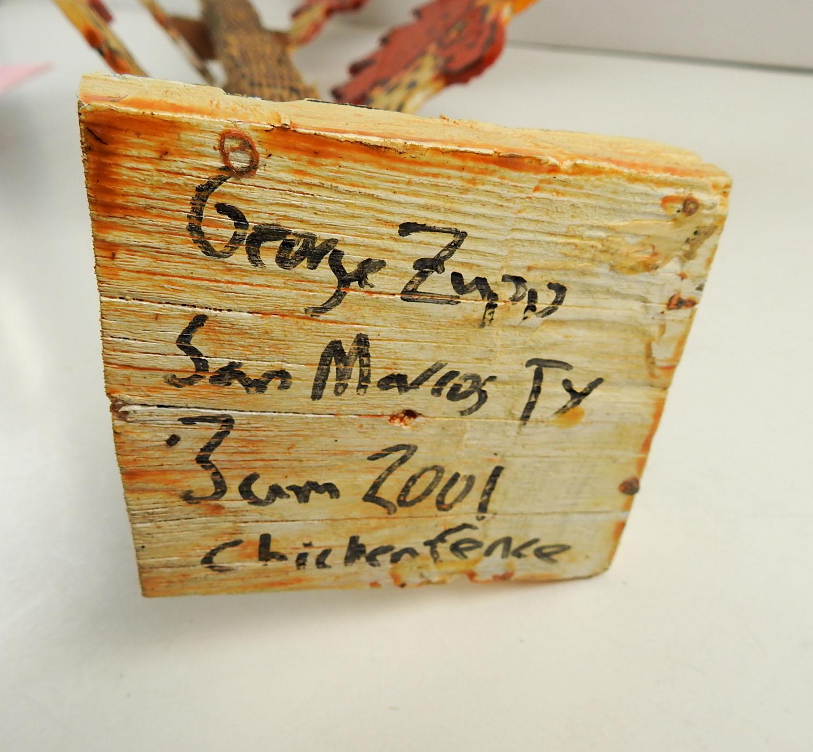 Carved and painted wood sculpture by Texas artist George Zupp AKA Chicken George. Signed, titled 