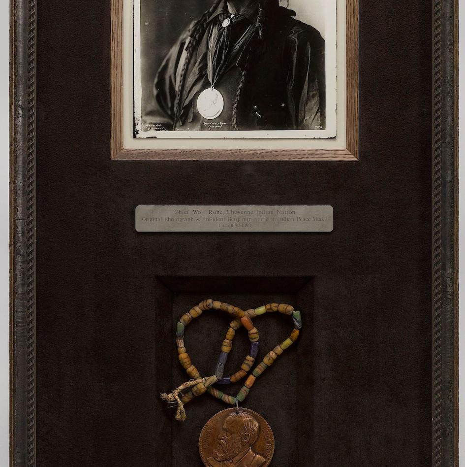 This is a collage featuring a photo of Chief Wolf Robe of the Southern Cheyenne and a Benjamin Harris 1890 Peace Medal. The photo was originally taken by Frank A. Rinehart in 1898 and this is one of his early original printings. Both the medal and