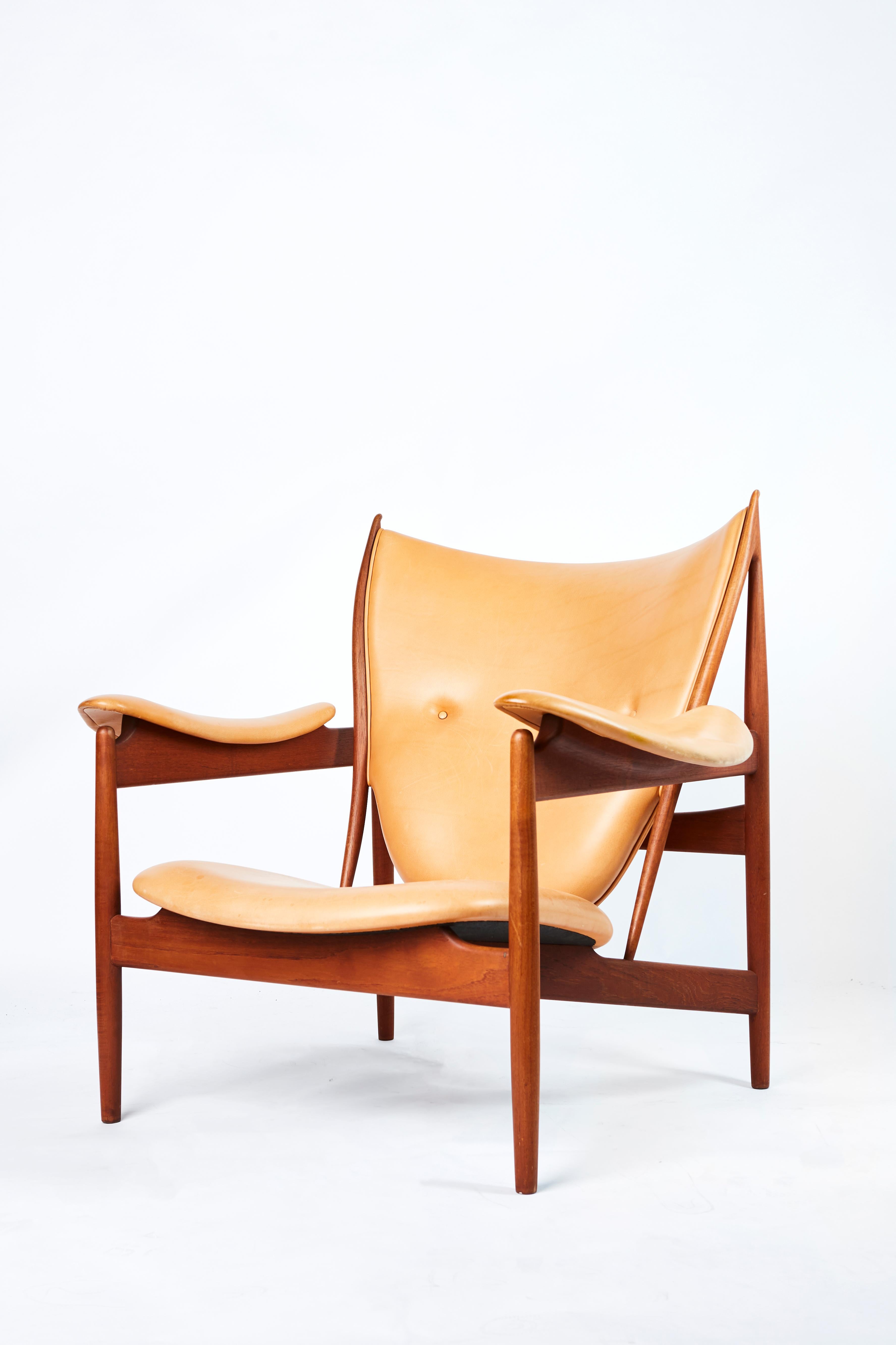 An absolutely beautiful piece of furniture is on offer here. 

Finn Juhl's 1949 masterpiece, the chieftain chair, employs iconography of tribal forms and Juhl’s innovative approach to design which accentuates the separation of the seat, back, and