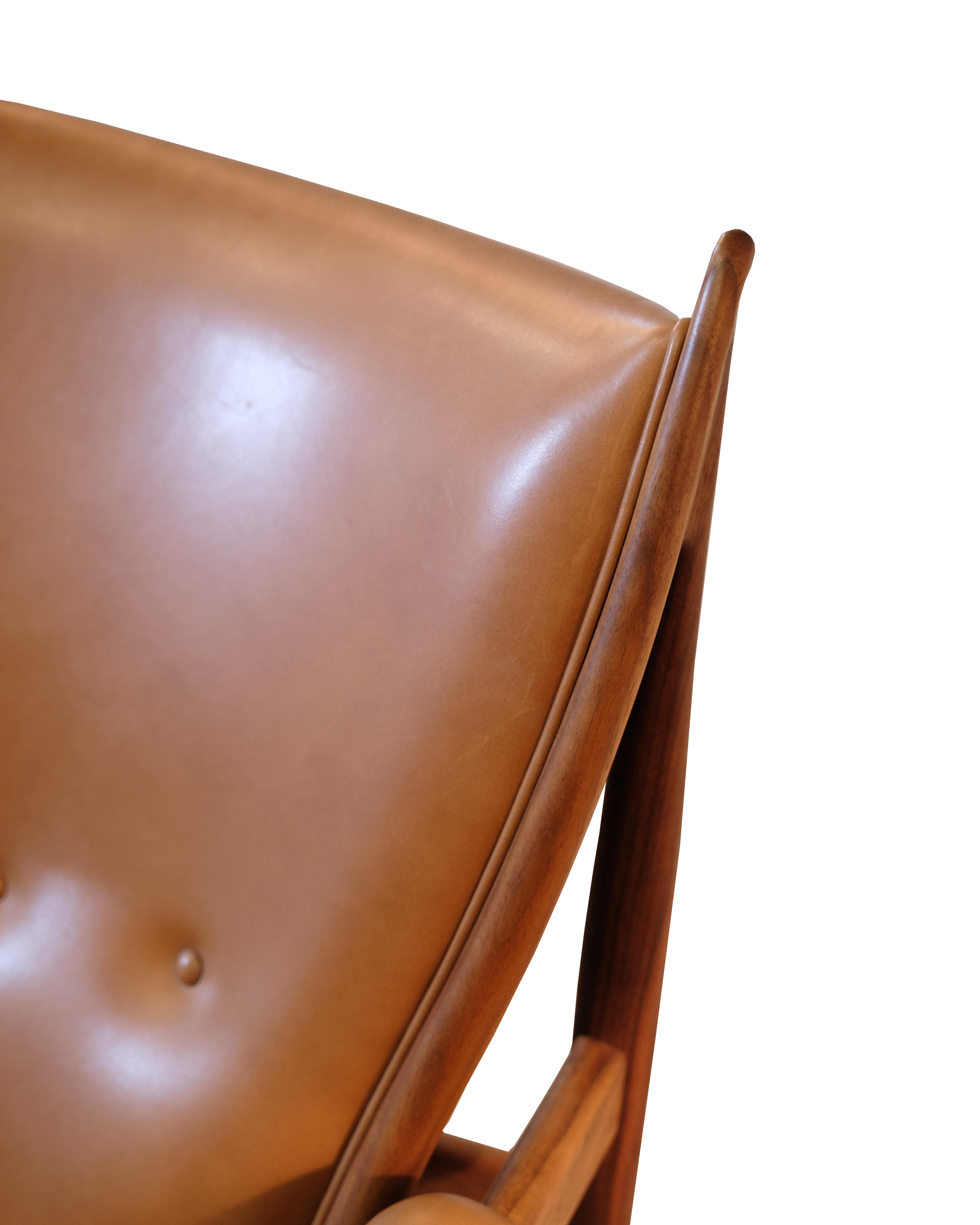 Chieftains Chair Model FJ4900 With Stool Made In Walnut By Finn Juhl 1