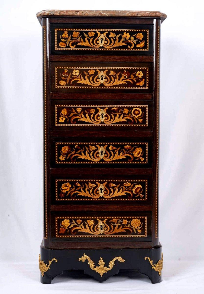 Small chiffonier in marquetry veneer of Rosewood, Rosewood and Lemonwood, with six drawers and topped with Royal Belgian Red marble.
The original thick marble has a corbin spout.

Period: Second half of the 19th century
Circa : 1870 -