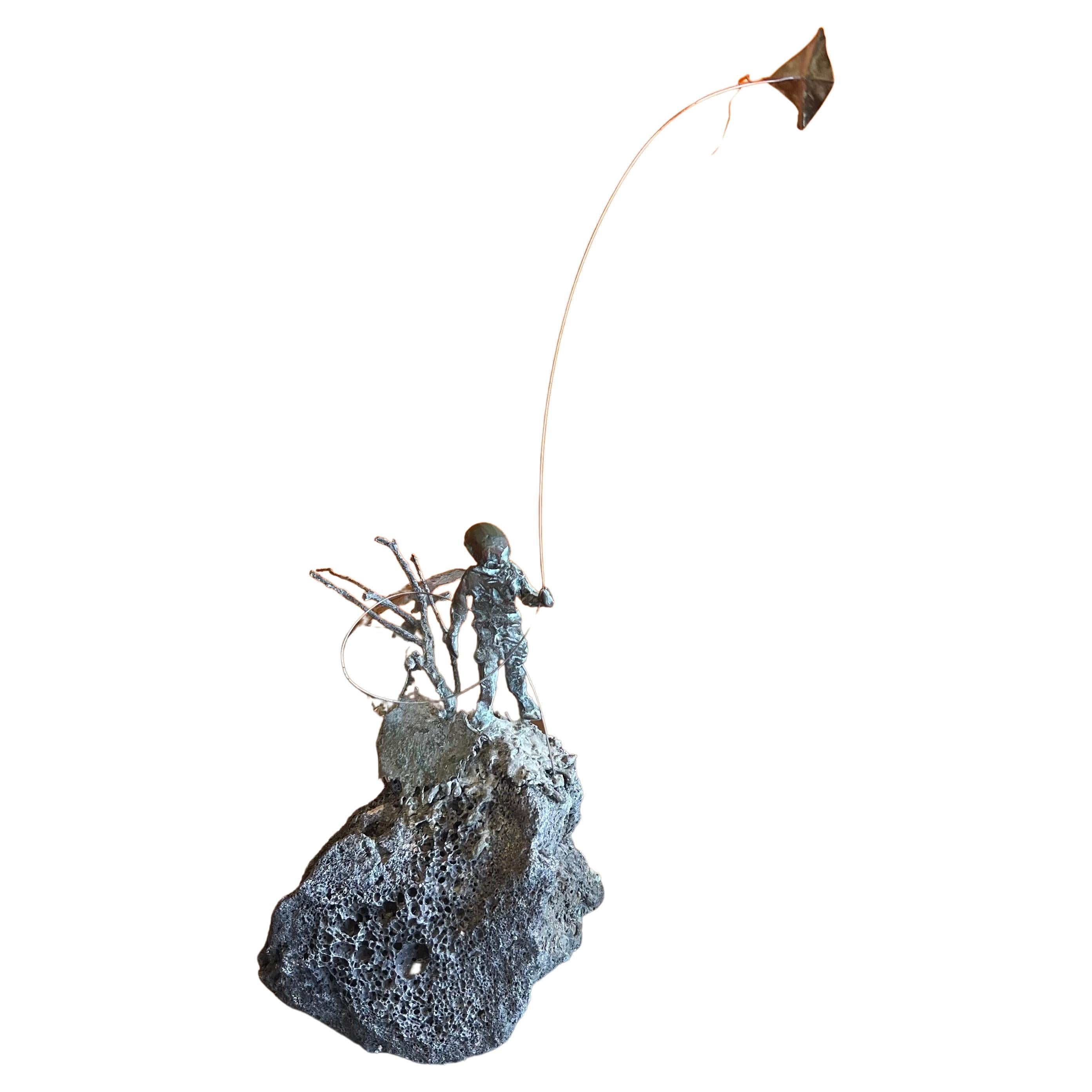 Child Flying Kite Bronze on Volcanic Rock Sculpture by Malcolm Moran For Sale