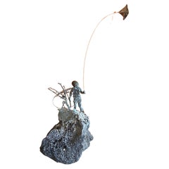 Vintage Child Flying Kite Bronze on Volcanic Rock Sculpture by Malcolm Moran