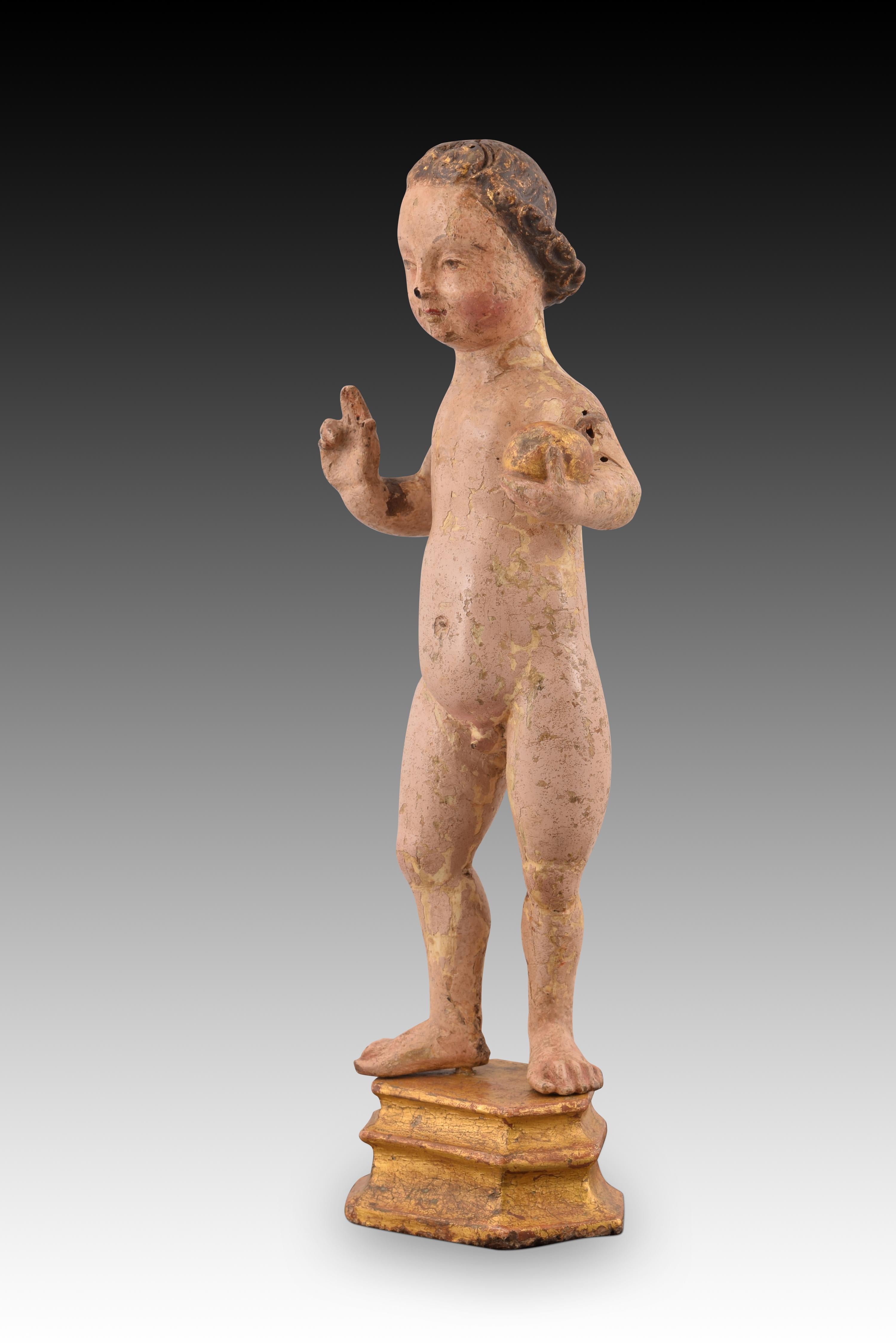 Child Jesus. Carved and polychrome wood. Flemish school, towards the first half of the 16th century. 
Baby Jesus with polygonal base made of carved and polychrome wood. The figure is presented naked, standing, with the right hand raised in a gesture