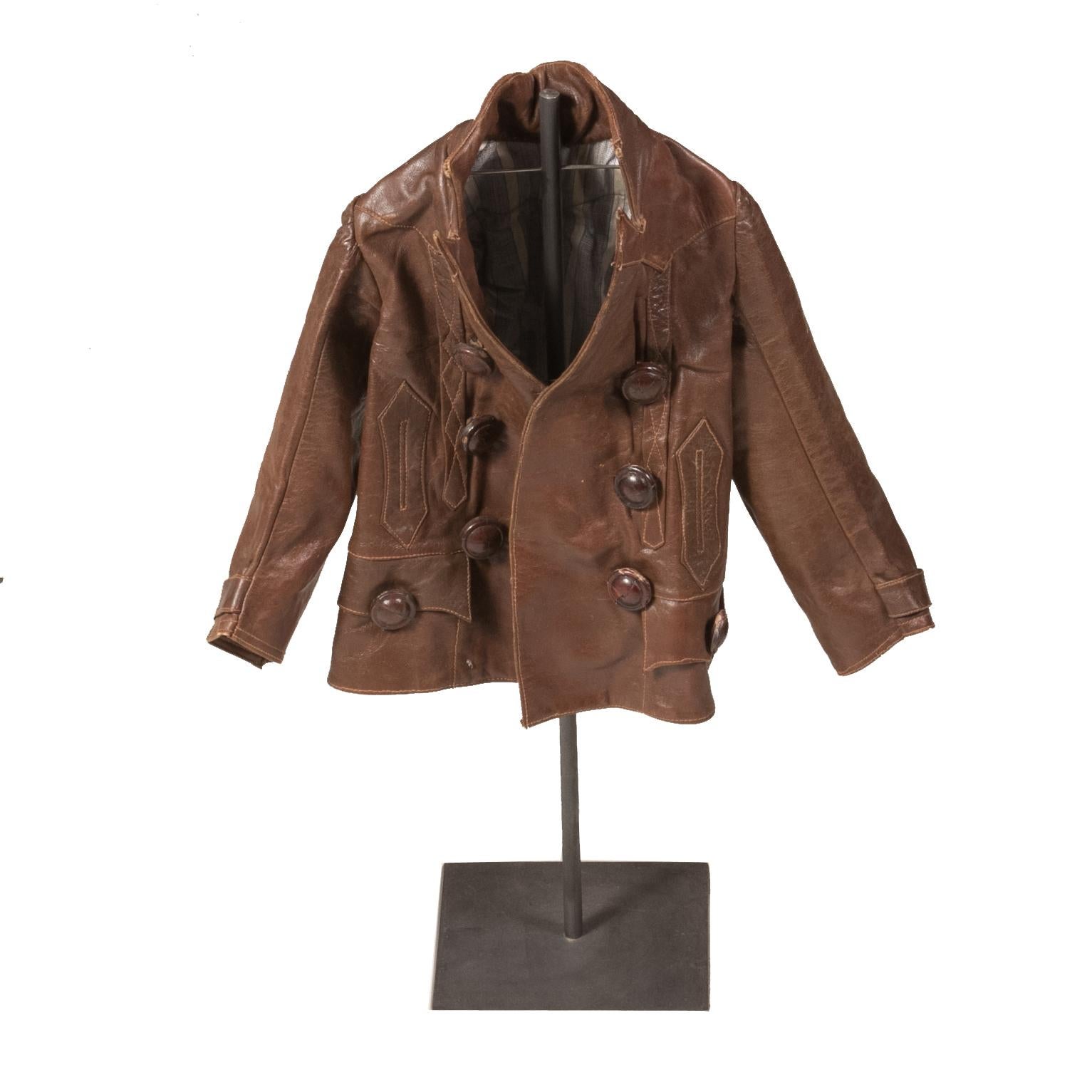 Child Leather Jacket Mounted on Metal Stand