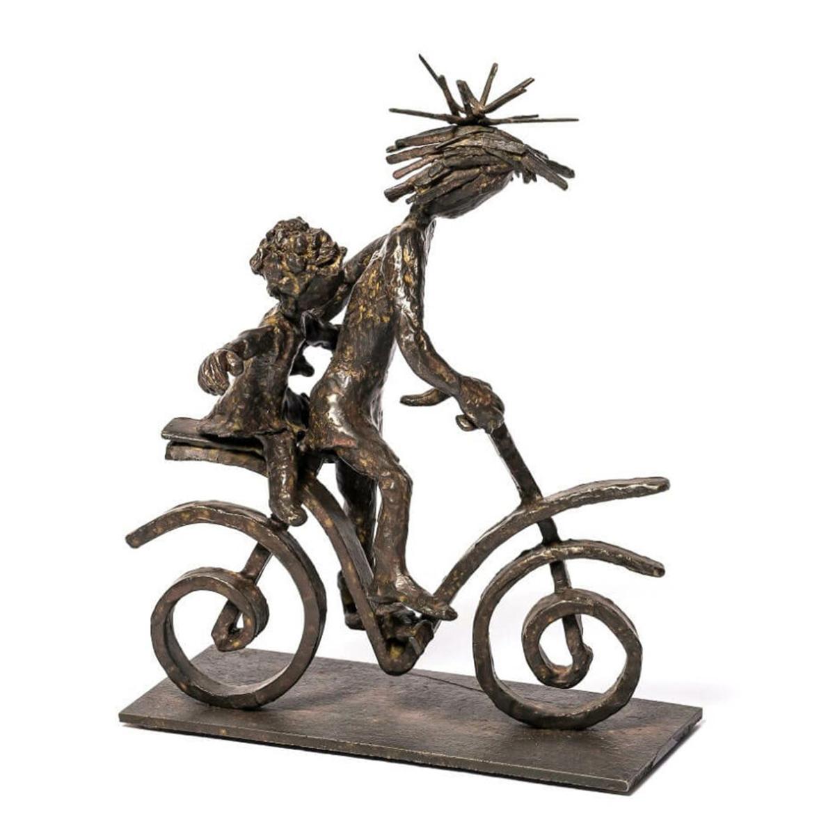 Sculpture Child on Bicycle Bronze all in solid
bronze in brown finish, on solid bronze base.