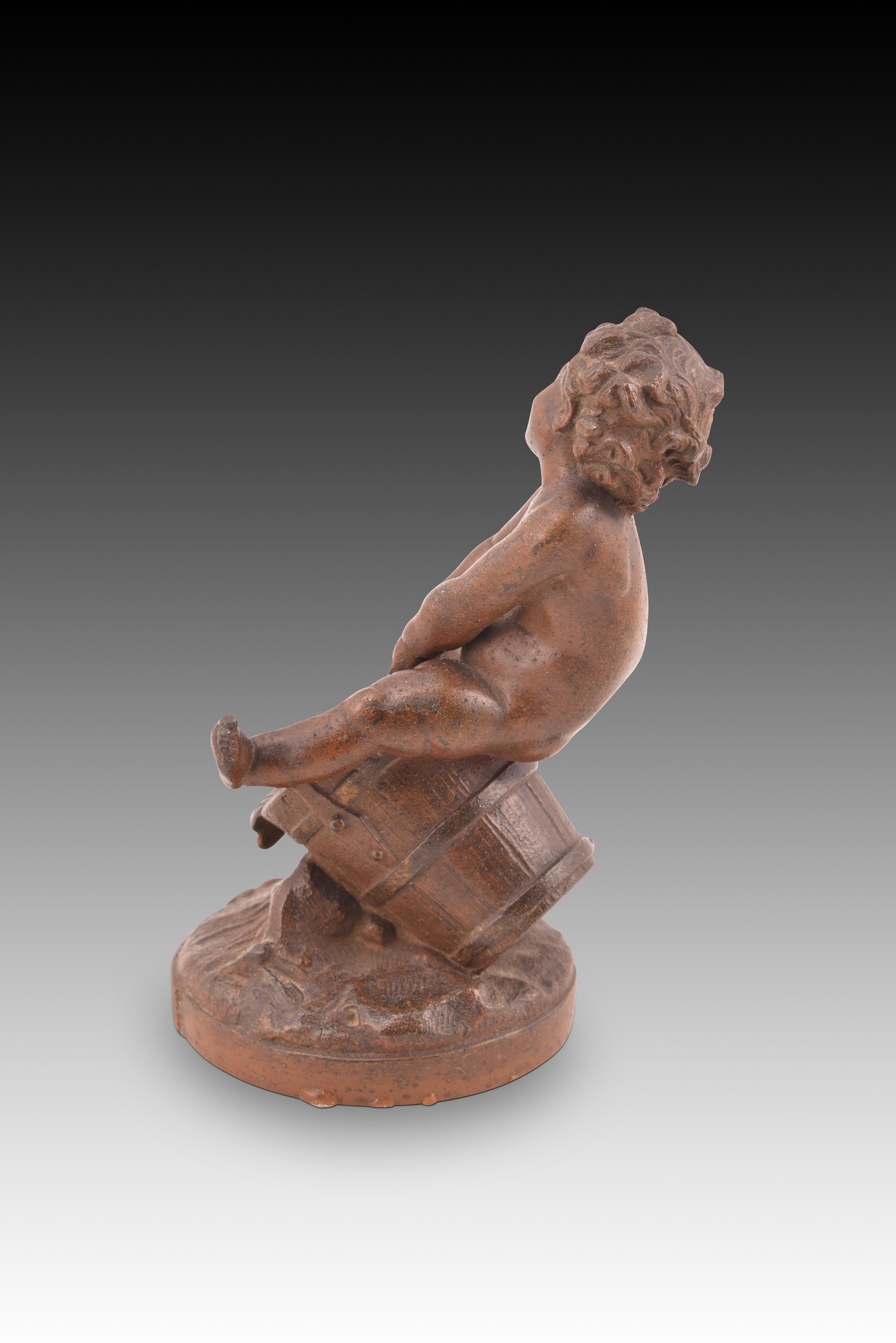 European Child riding a bucket, figurine. Calamine. Circa 1900. For Sale