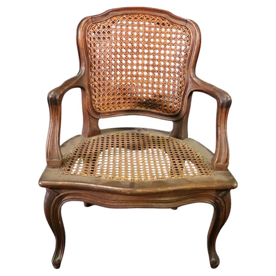 Child Size French Made 1920s era Hand Woven Louis XV Style Cane Arm Chair For Sale