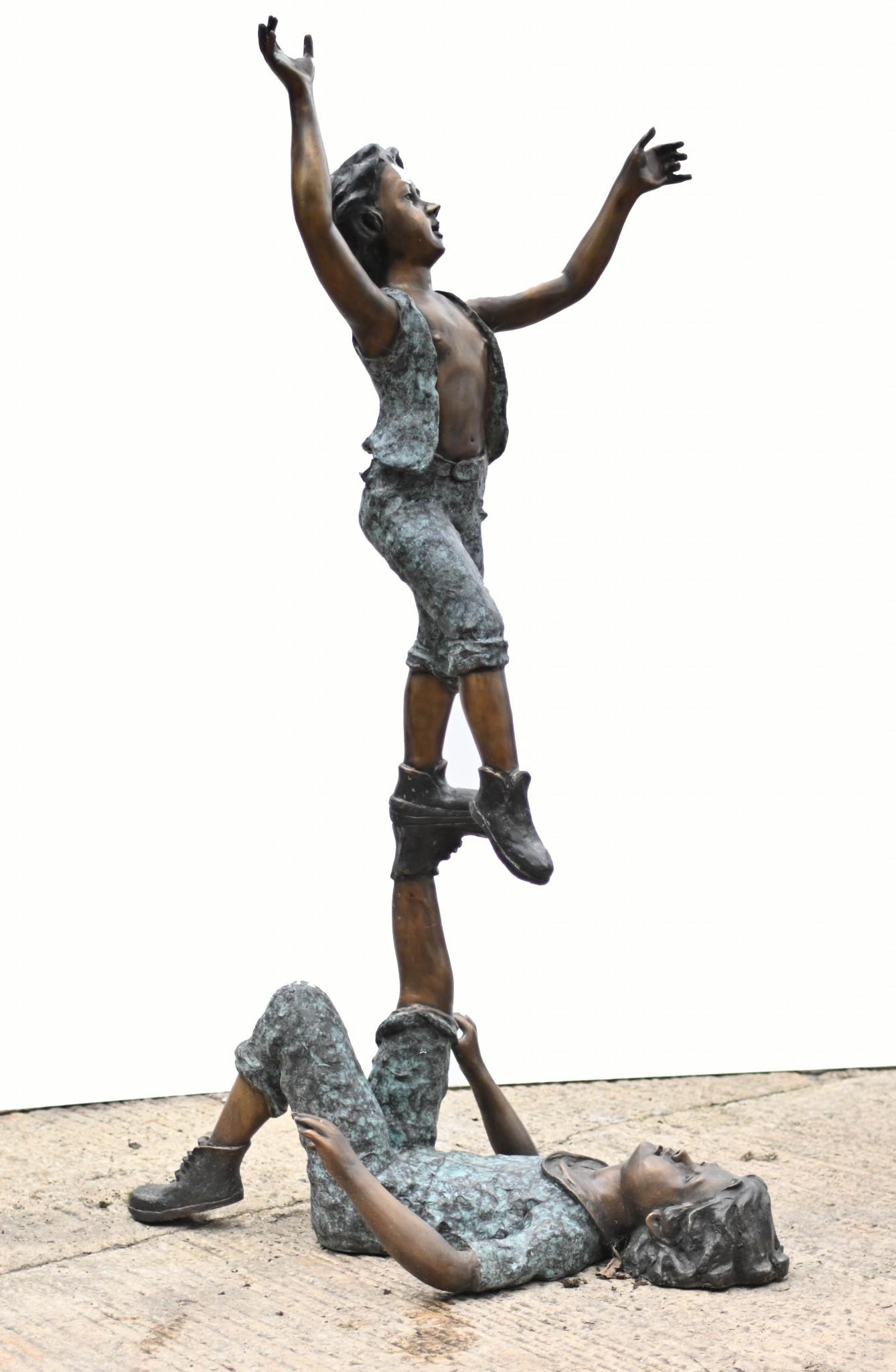 Stunning bronze statue showing a pair of boy acrobats
Great for the garden and of course being bronze can live outside with no fear of rust
Stands in at nearly six feet all - 170 CM
Great architectural work of art
Antiques Herts showroom, just 25