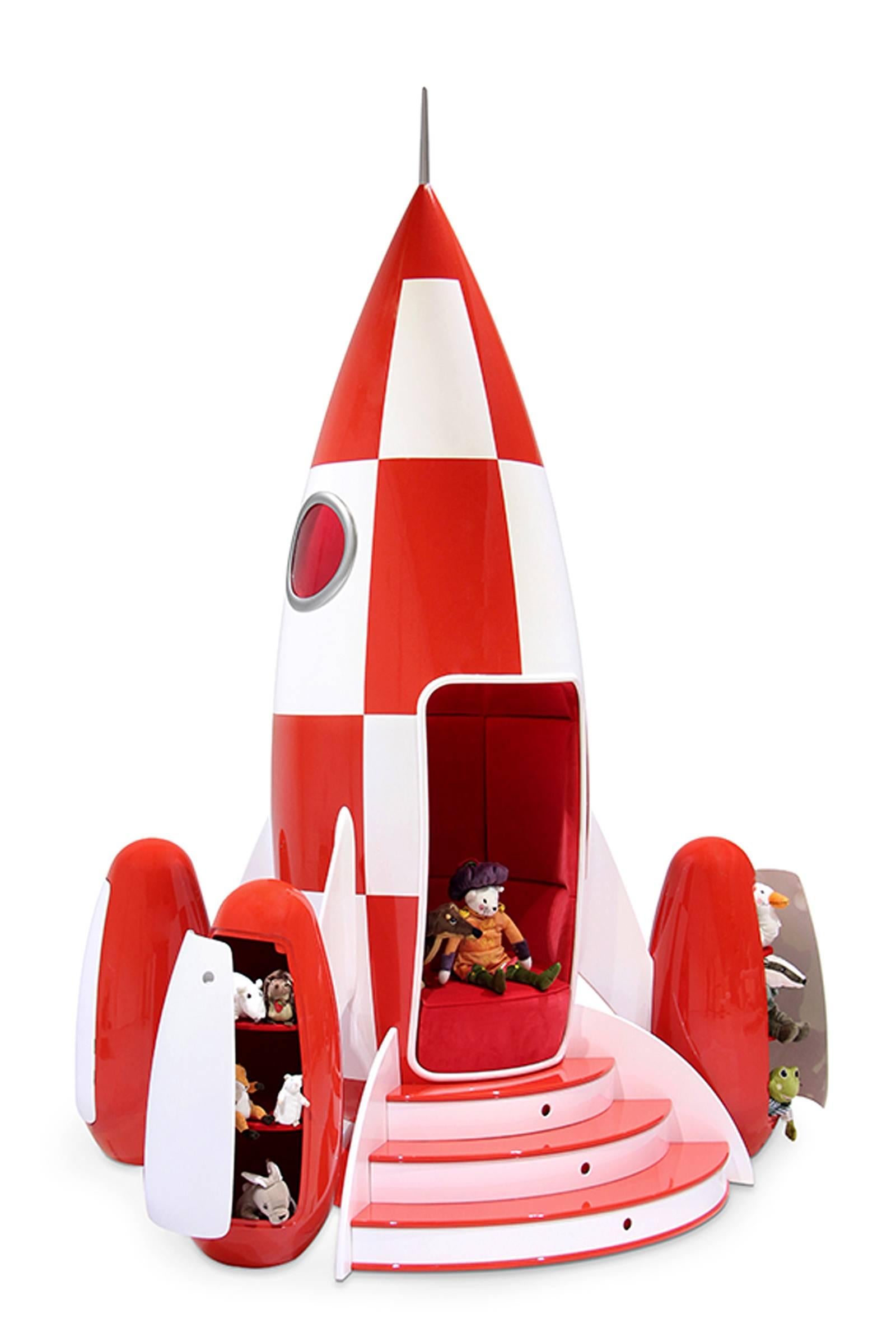 Rocket children chair in fiber glass ideal to go on the moon.
Square are made with masc paint, red velvet upholstery inside.
Sound system and lights are controlled by a mobile apply with 
several options: Choice of music, light effects and sleep