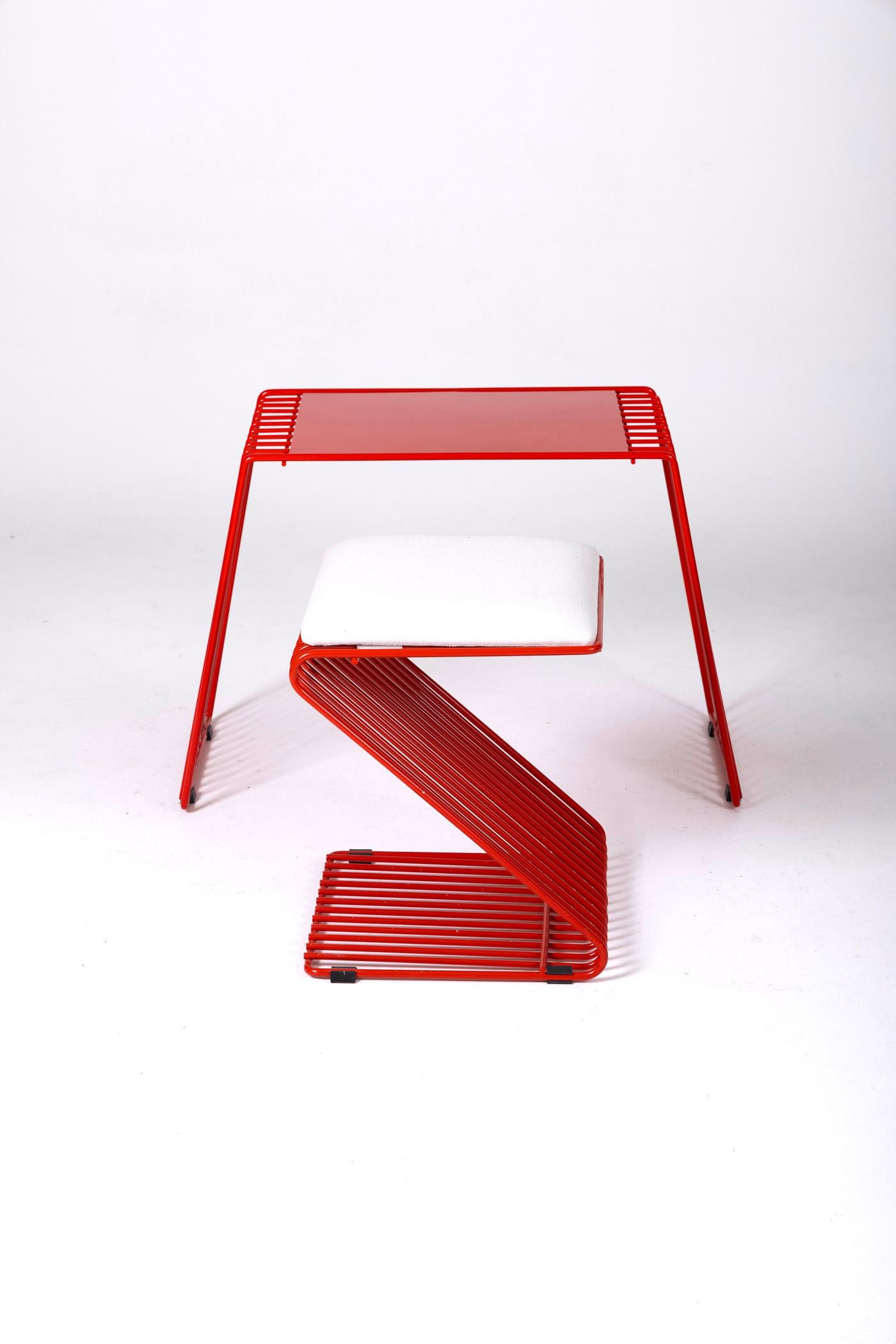 Children's Desk by Designer François Arnal for Atelier A. Created in 1968, Atelier A's goal was to highlight the design of everyday objects. This desk, originally designed for children, features a tubular structure in red lacquered metal and clean
