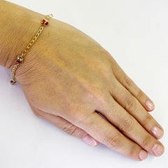 Pulsera infantil mariquita de oro amarillo