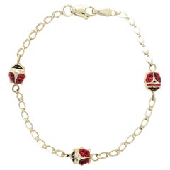 Pulsera infantil mariquita de oro amarillo