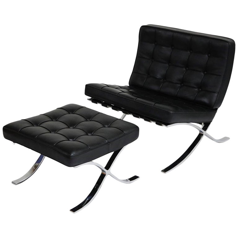 A Gustav Axel Berg Status Black Leather Easy Chair With Black