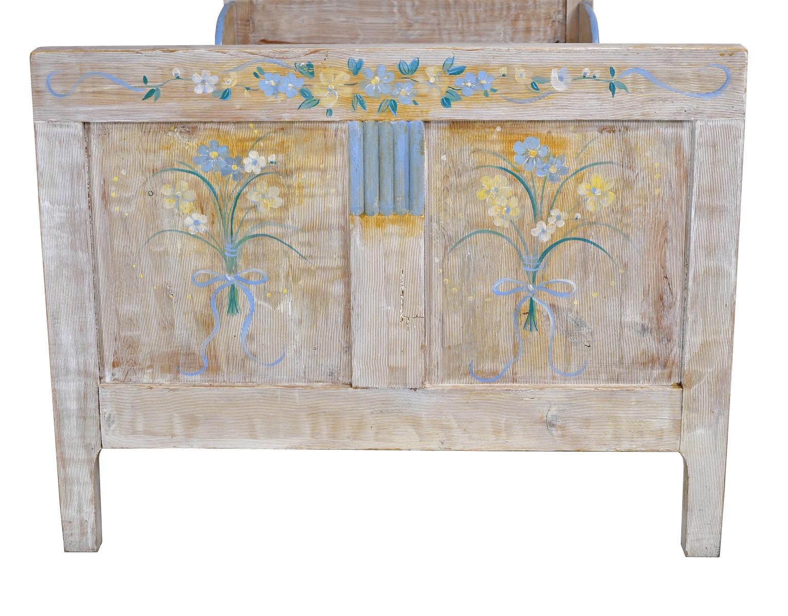 Pine Child's Bed with Blue & Yellow Flowers over White Background, Europe, circa 1920