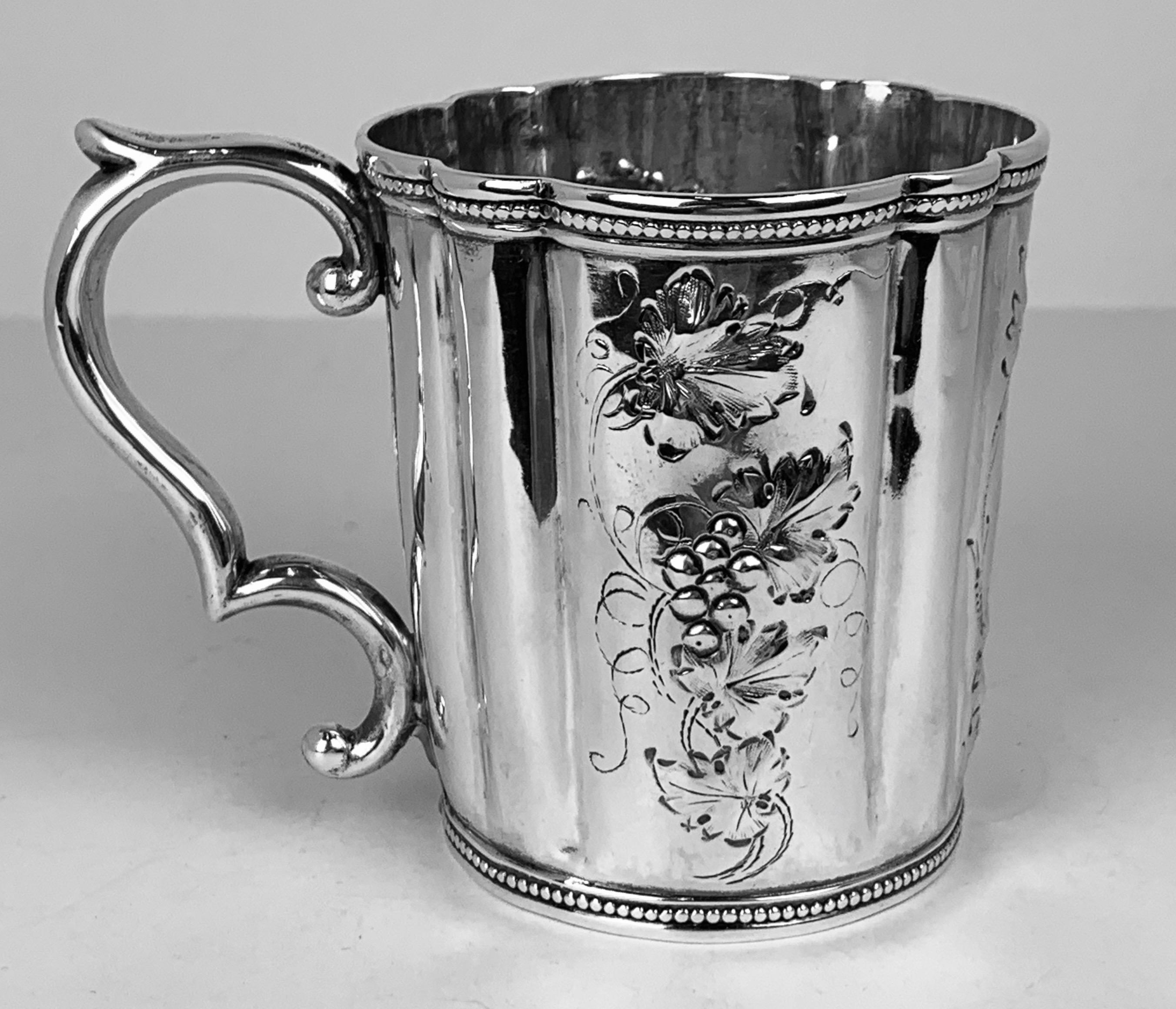 Child's coin silver repoussé cup by Tift & Whiting. Founded in North Attelboro, Massachusetts by Albert C. Tift and William D. Whiting. The company operated in business from circa 1840-1853. They were makers of quality coin silver and used the tag