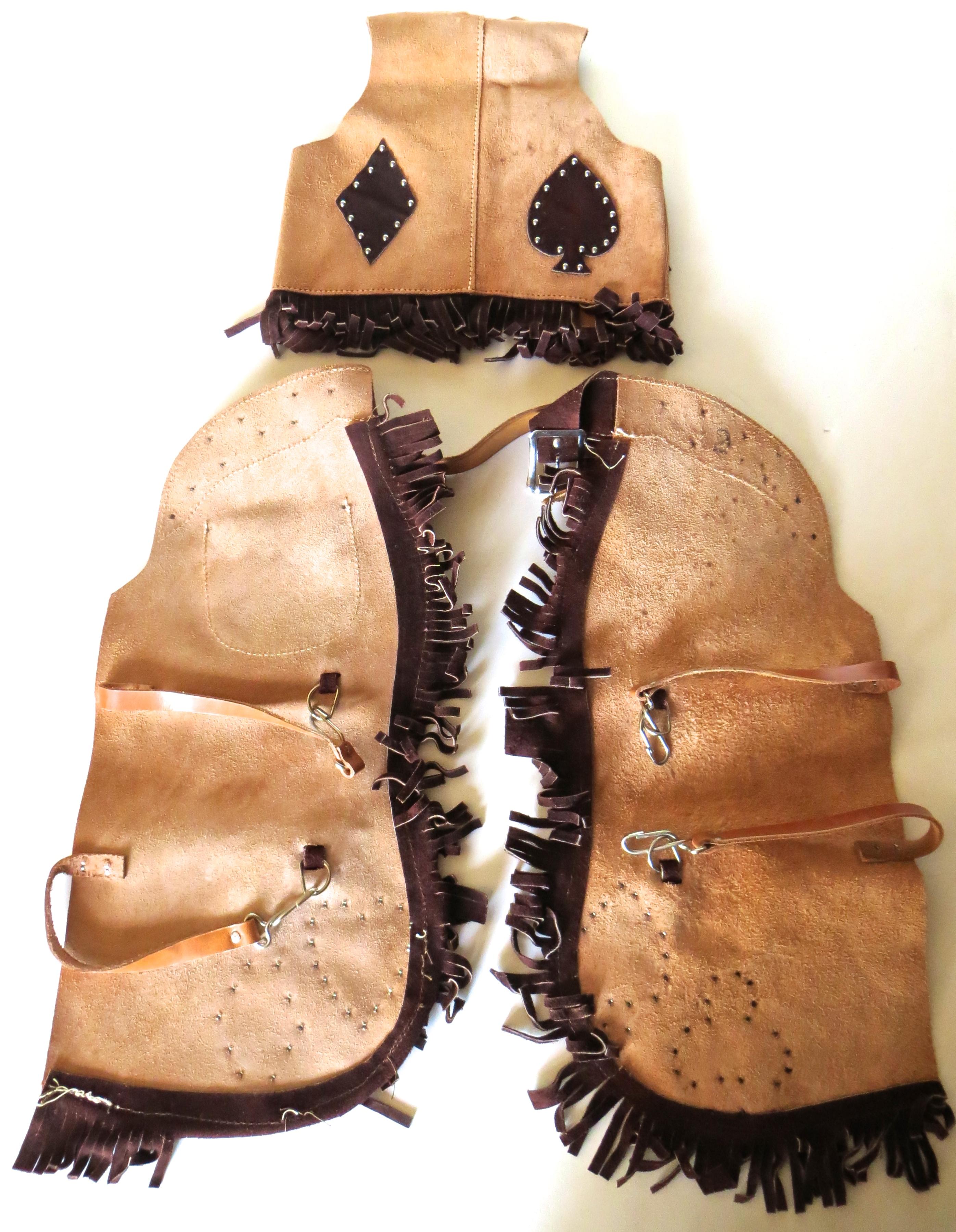 Vintage child's cowboy boots (see images); authentic American made suede western child's cowboy outfit; manufactured in Texas, circa 1948-1952. Fine quality suede is used to dress up a young cowboy with a vest and a well made pair of chaps. The