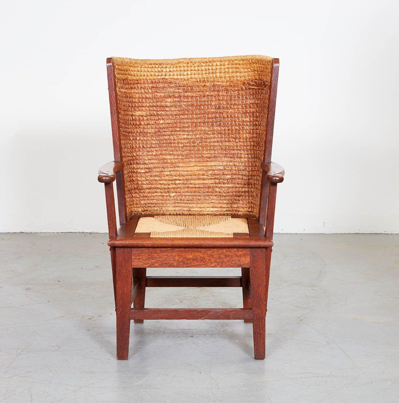 Early 20th century diminutive Orkney Islands chair. These chairs have been made for 200 years on the Orkney Islands off of Scotland using the natural rush and wood found on the island. They were made for sitting next to the fire and keeping the