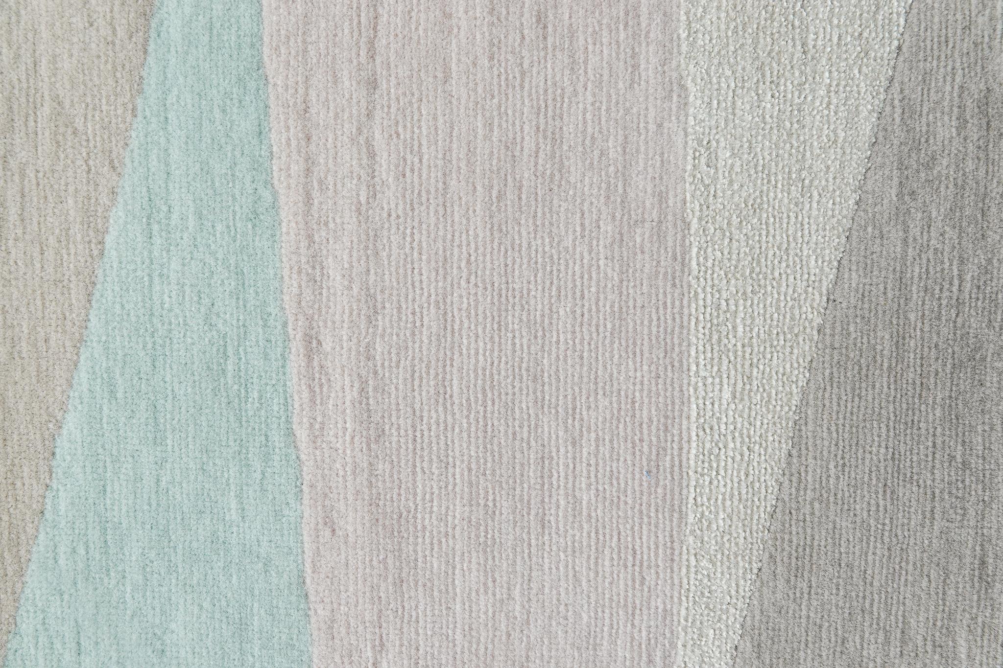 Rug design as a symphony of color

Democratic rug for spaces with elements of light, warm woods and natural light. The rug is composed of free-form and free-sized figures, which complement each other. Delicate pastel colors are combined with dusty