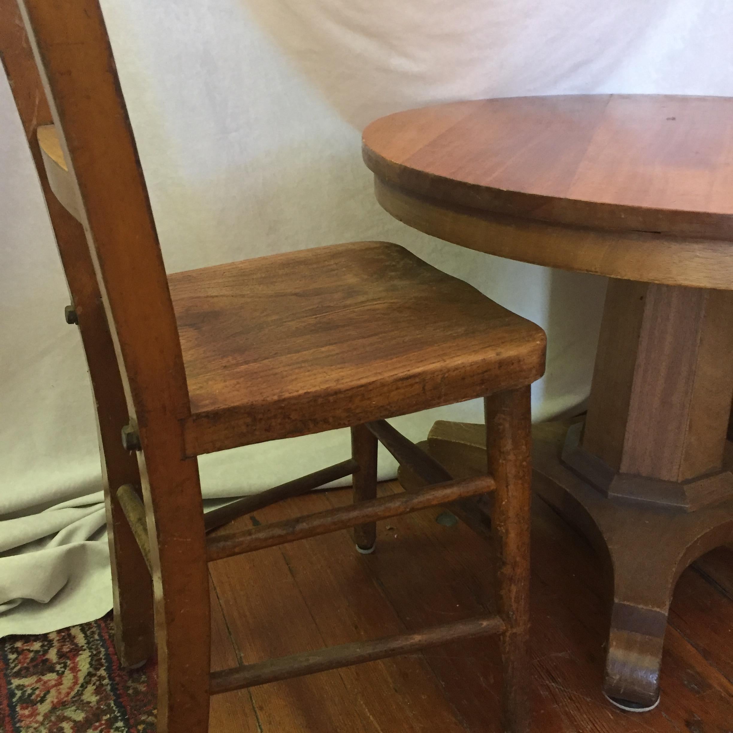 This table is quite special as it imitates what grownups use in their dining room. The top mounted on a pedestal is what makes it so desirable and collectible. Made of mahogany in the U.S. and nicely refinished. We hunted for years just to find some