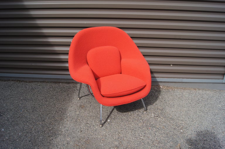 This cozy chair is a child's version of Eero Saarinen's iconic Womb Chair for Knoll. Scaled to 75% of the modernist classic, it, too, has a contoured frame of fiberglass supported on polished chrome legs and upholstered in a Knoll textile — here