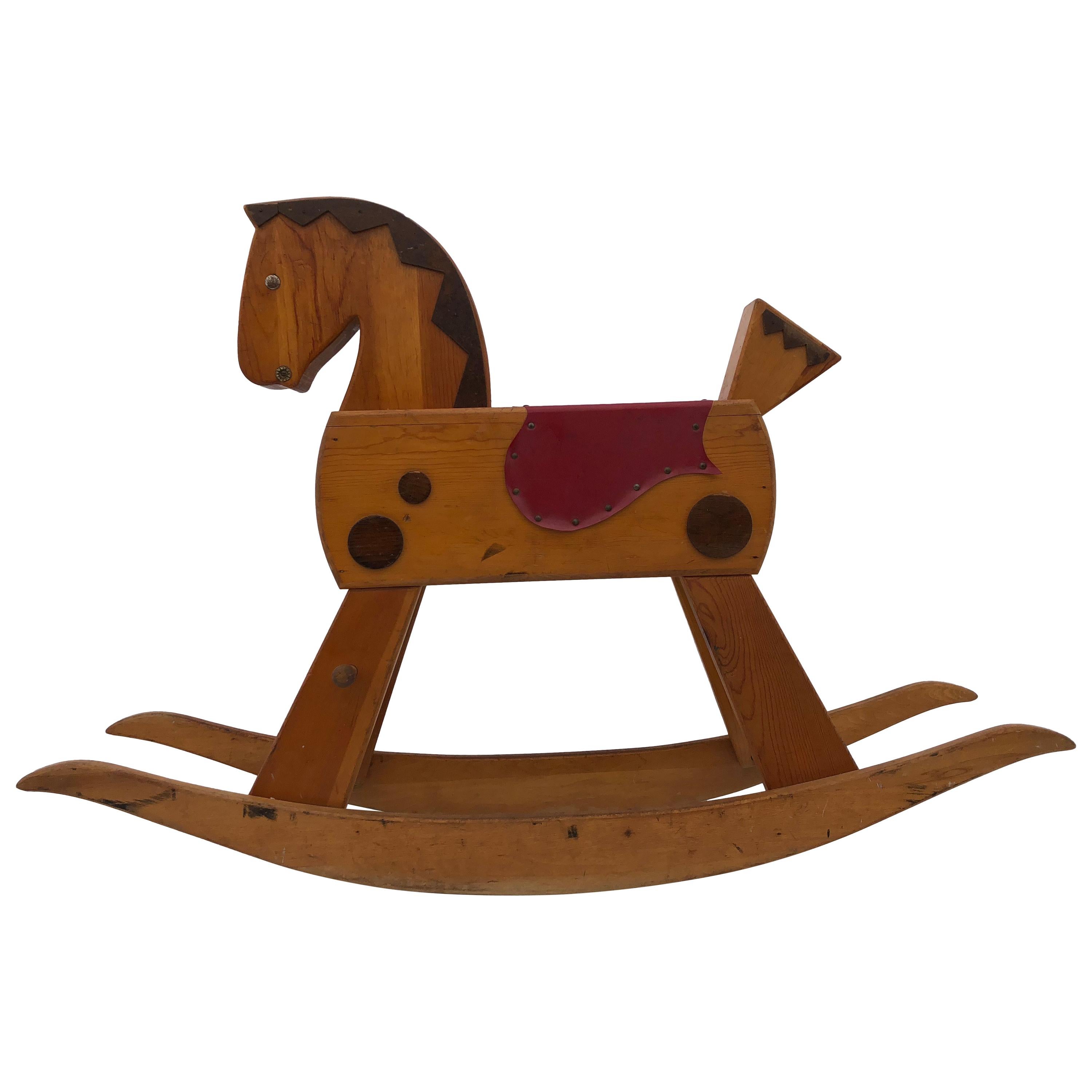 Child's Wooden Rocking Horse with Footrest, Black Wood Mane and Red Saddle For Sale