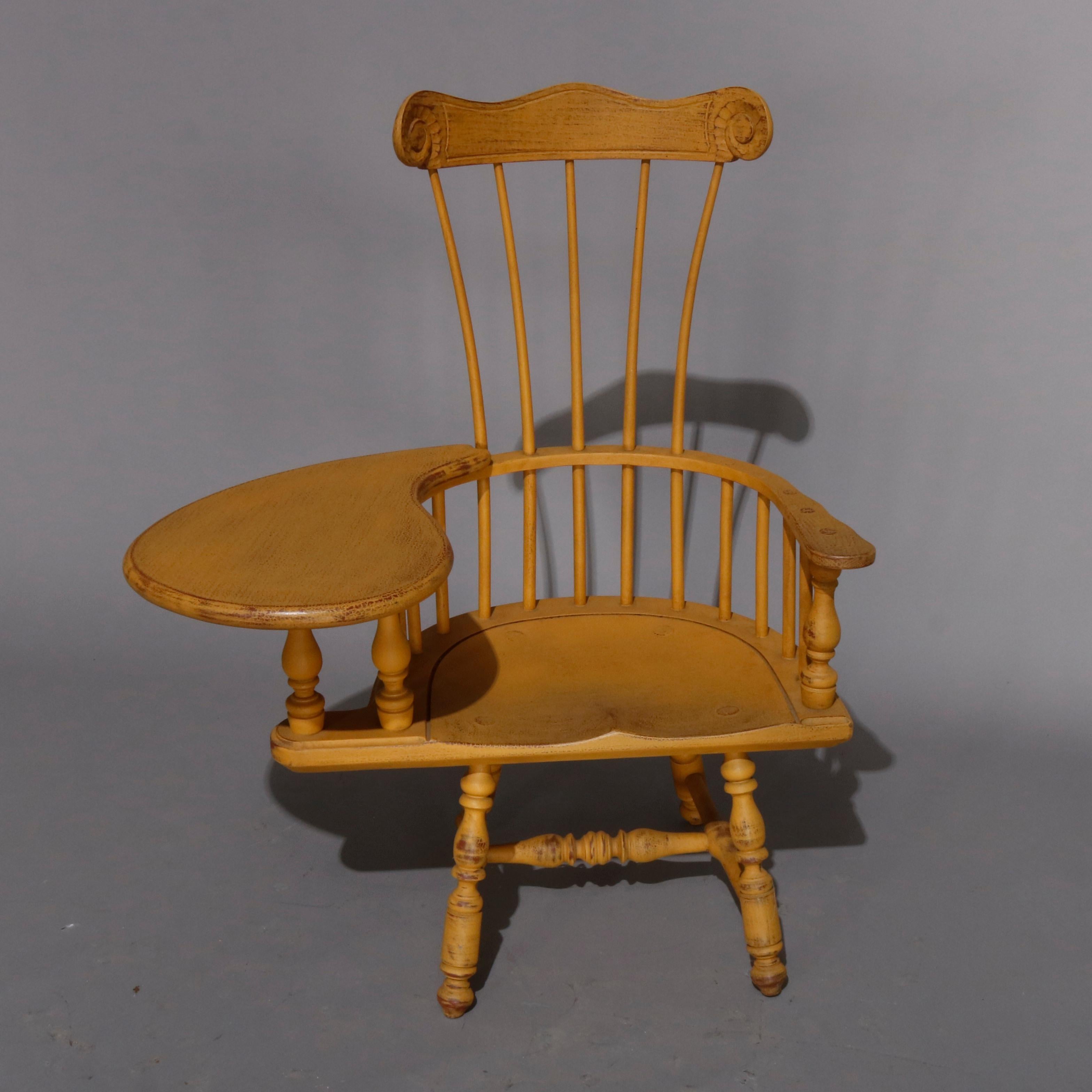 Child's writing arm Windsor chair offers yellow painted tall back chair with scroll crest surmounting spindle back and arms, one with writing desk, 20th century

***DELIVERY NOTICE – Due to COVID-19 we are employing NO-CONTACT PRACTICES in the