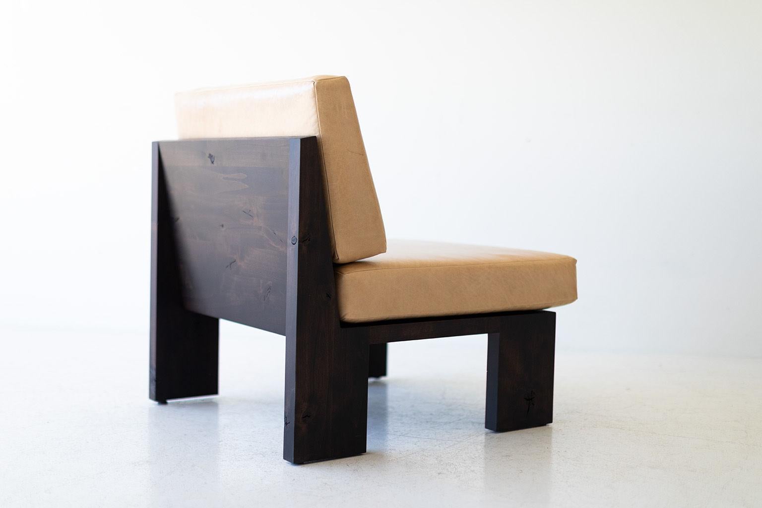 This Chile modern side chair is beautifully constructed from solid wood in Ohio, USA. The lounge chair's silhouette is simple, modern, and sleek with comfortable back and seat cushions. This is the perfect chair for any space, indoor or outdoor.