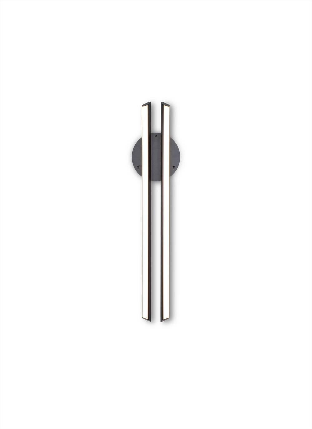 CHIME 35 sconce is inspired by the harmonious sound of resonating bells. CHIME 35 features two parallel bars of soft warm light floating over a disc backplate. Available in two sizes, perfect for a hallway or vanity.

Metal finish
Powder-coat finish