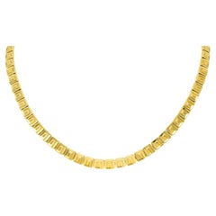 Chimento, collier réversible à maillons carrés géométriques en or 18 carats avec clé grecque