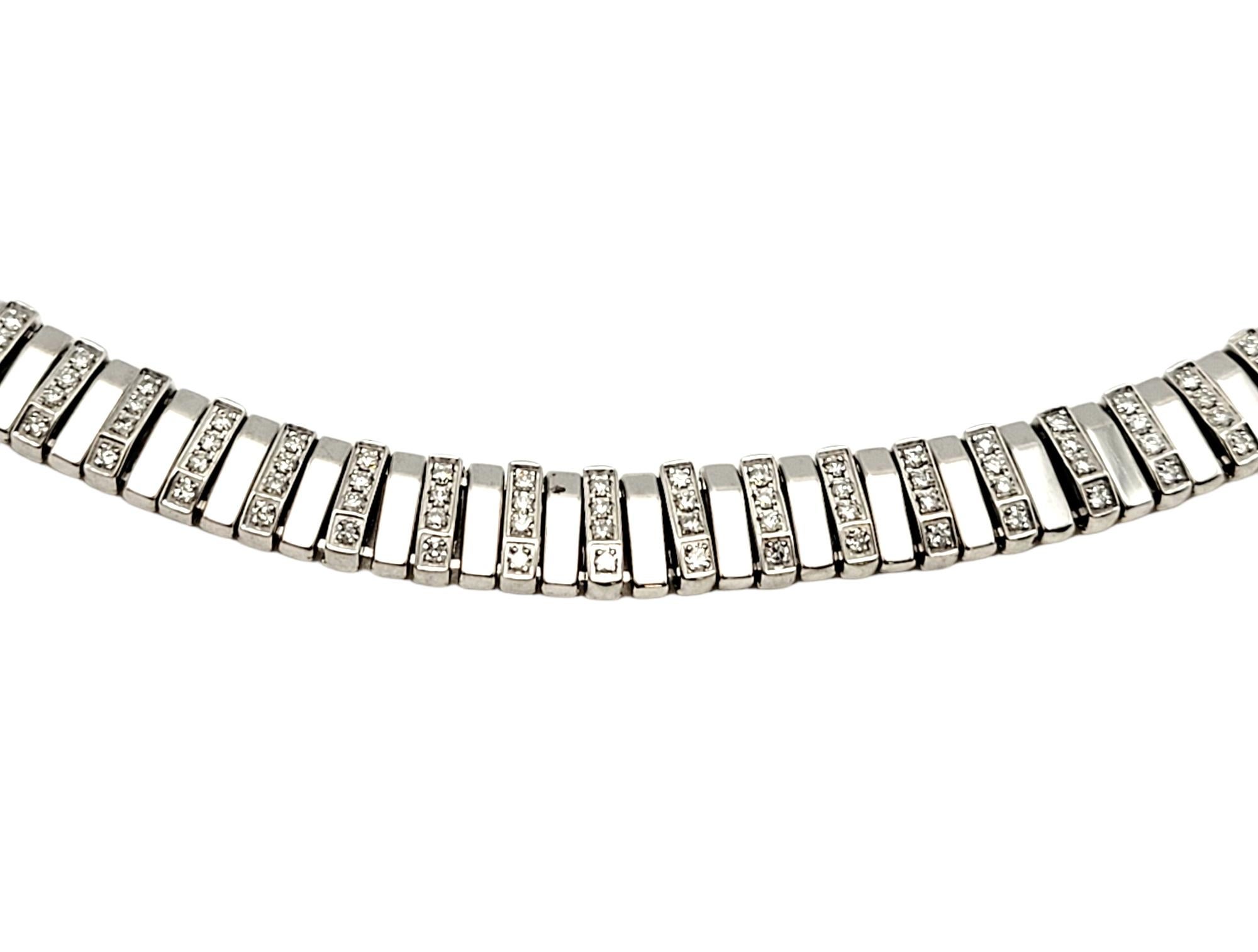 You will absolutely love this strikingly beautiful minimalist necklace by Chimento. It is stunningly simple in design, with curved lines and glittering pave diamonds, making the piece absolutely glow! This lovely necklace features a series of solid