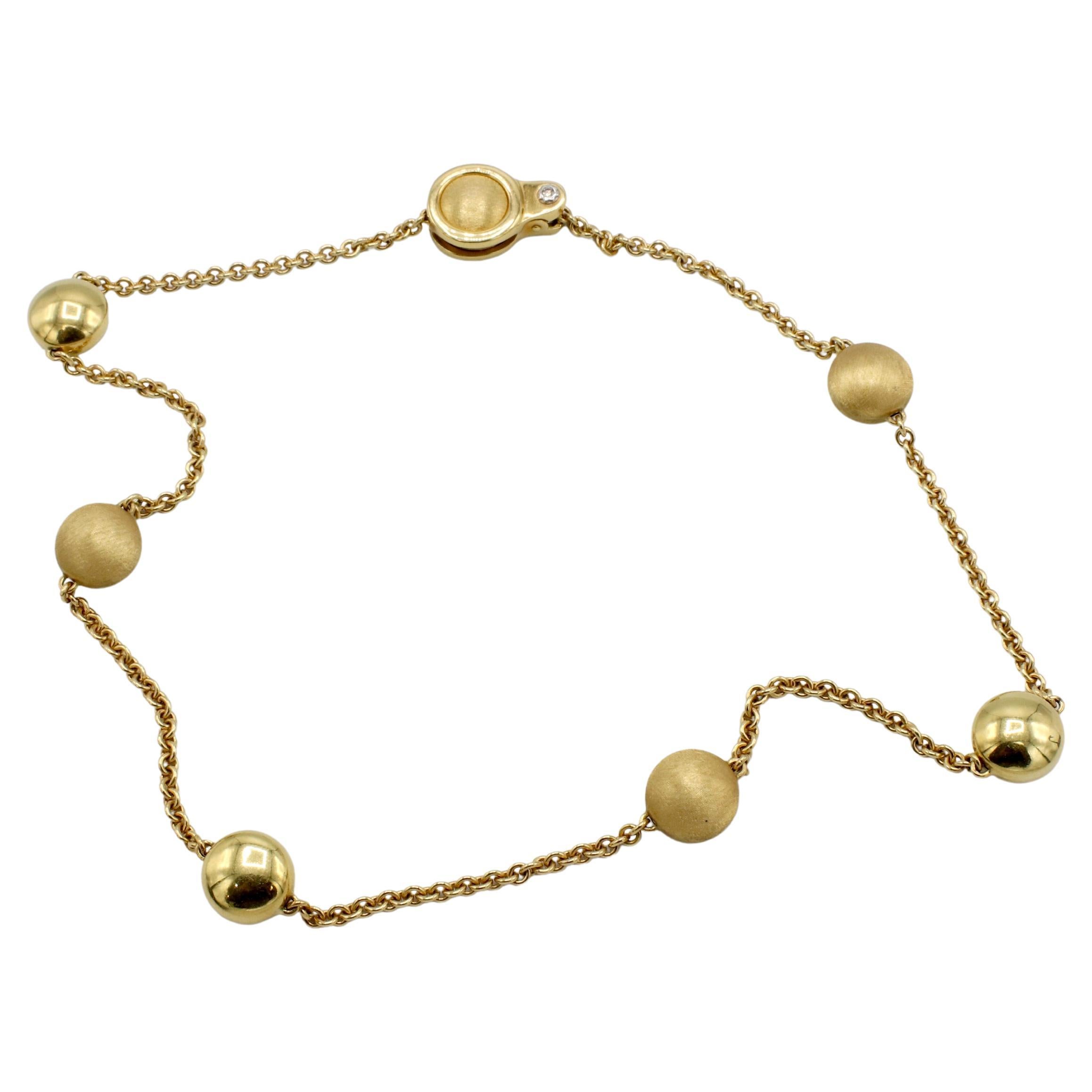 Chimento Collier à maillons station en or jaune 18 carats perlé de diamants naturels
Métal : or jaune 18k
Poids : 22 grammes
Diamant : 1 diamant naturel rond de 0,02 carat G VS1
Longueur : 16 pouces
Largeur : 2-11 mm
Signé : CHIMENTO 750
INT