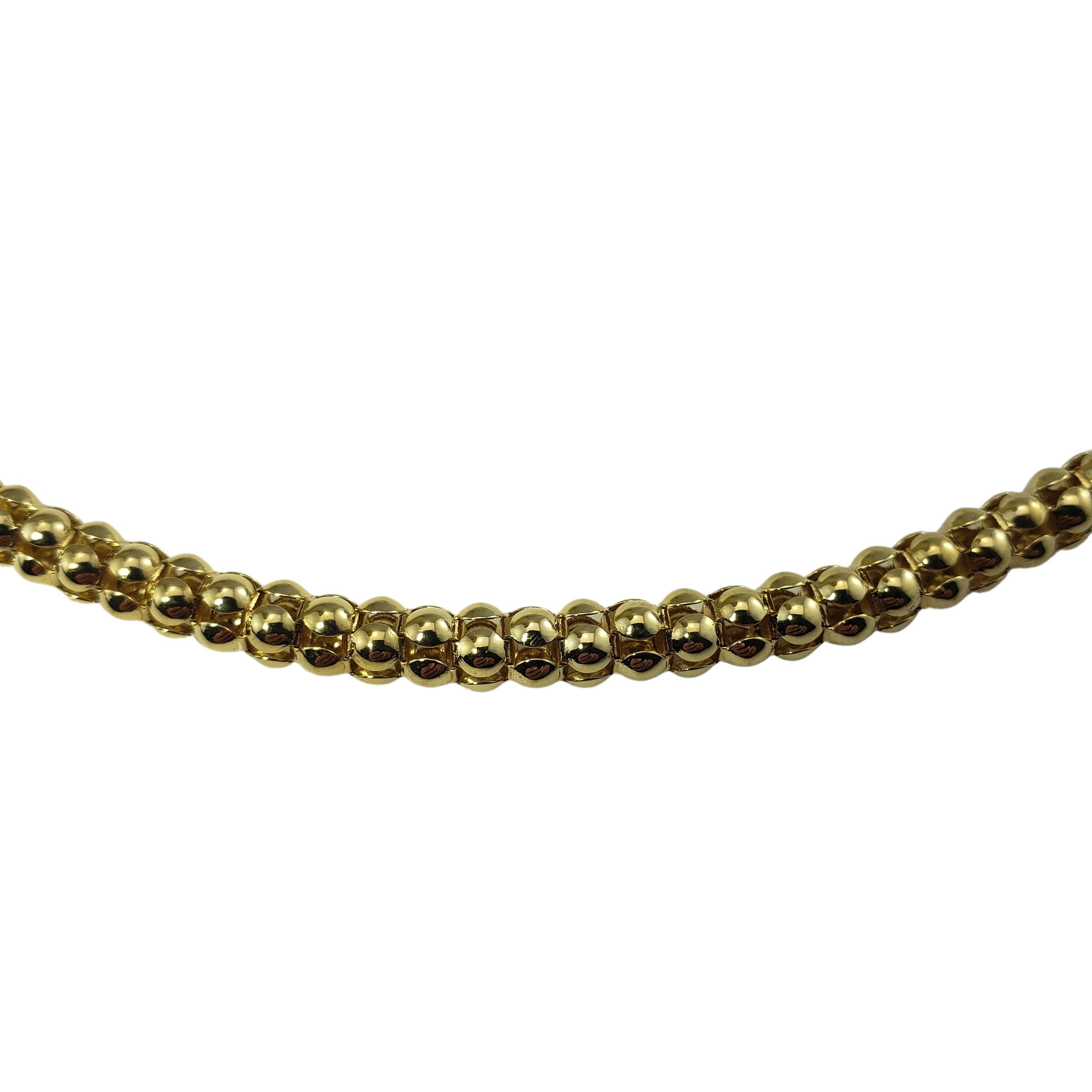 Chimento 18 Karat Yellow Gold Necklace-

This stunning necklace is crafted in beautifully detailed 18K yellow gold by Chimento.  Width:  5 mm.

Size:  17.5 inches

Weight:  14.9 dwt. /  23.2 gr.

Hallmark:  408V  MED.  DEP  750

Very good condition,