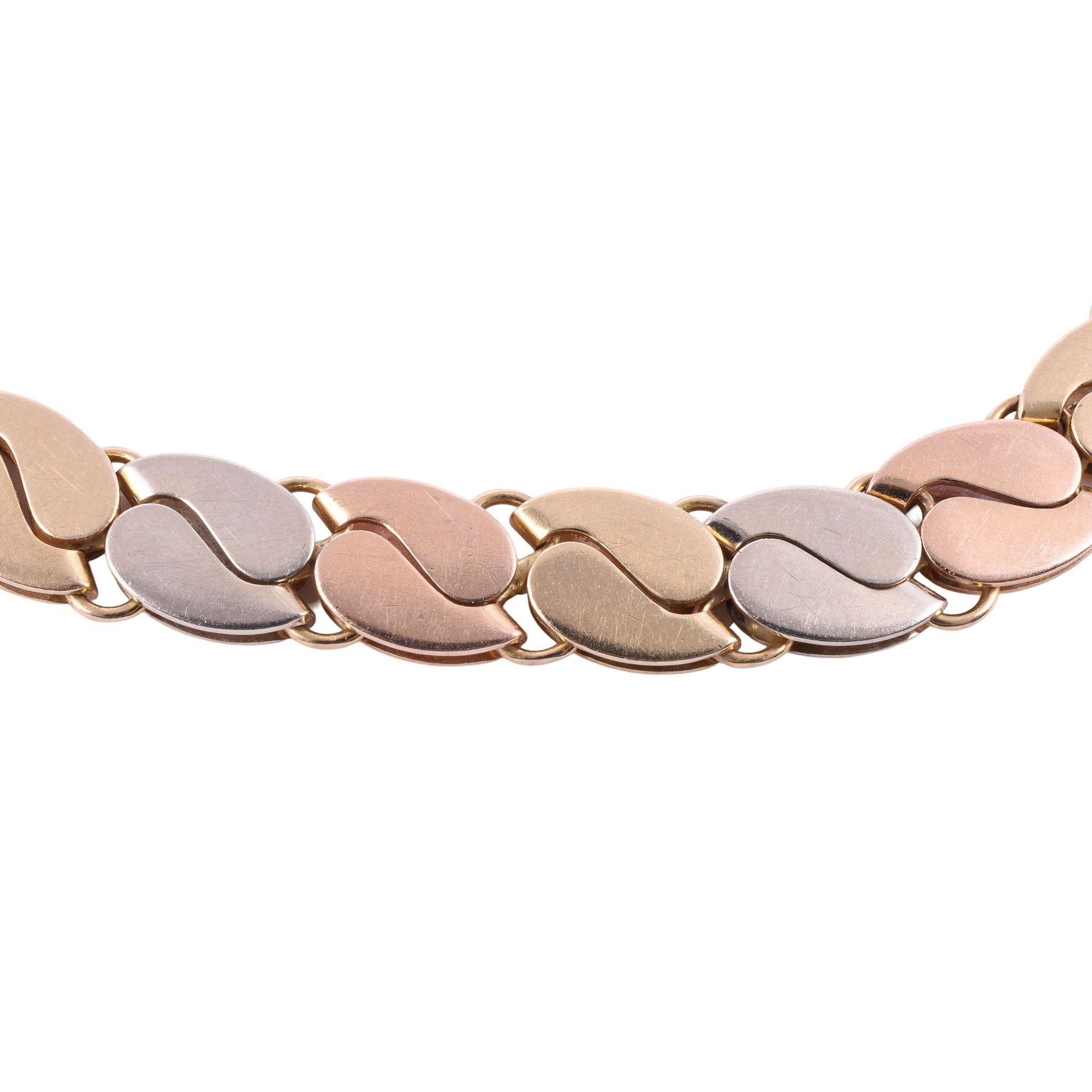 Estate Italian Chimento 18K tri color gold bracelet, circa 1980. This fancy link bracelet by Chimento is crafted in 18 karat yellow, white, and rose gold. The three tone gold bracelet weighs 19.2 grams. [KIMH 564]
 
Dimensions
7.5″L