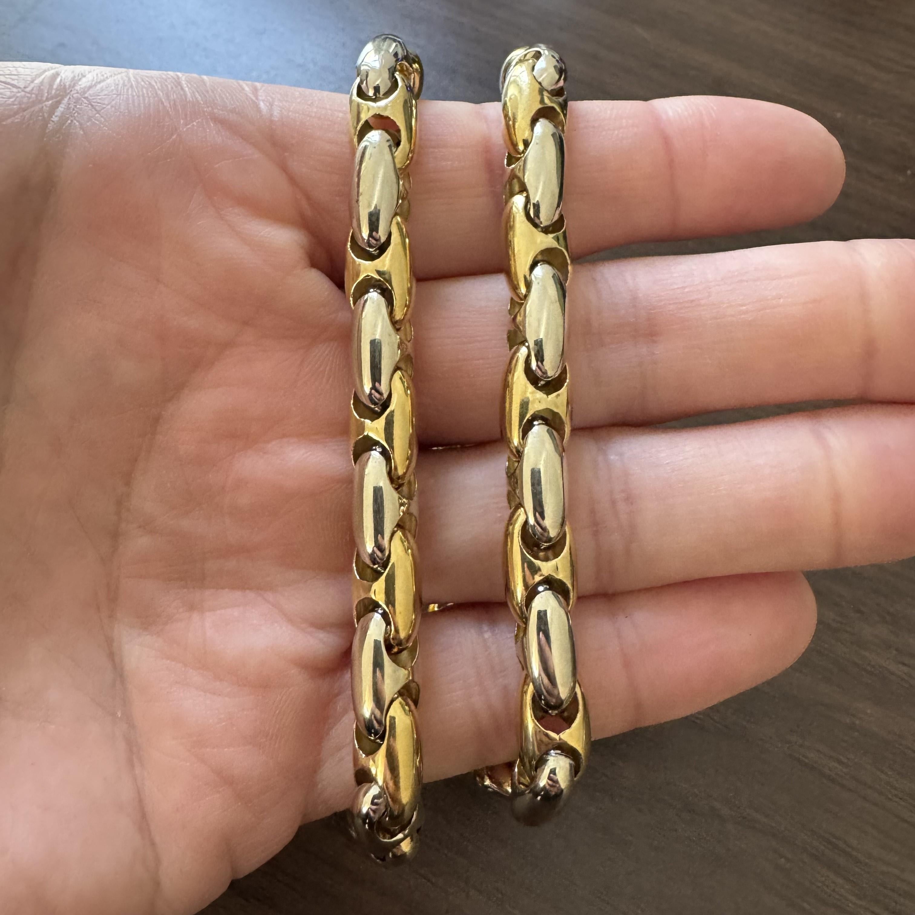 Condition:  Excellent Condition, Professionally Cleaned and Polished
Metal:  18k Gold (Marked, and Professionally Tested)
Weight:  63.3g
Length:  18 Inches
Width:  8mm
Closure:  Lobster Claw
Markings:  