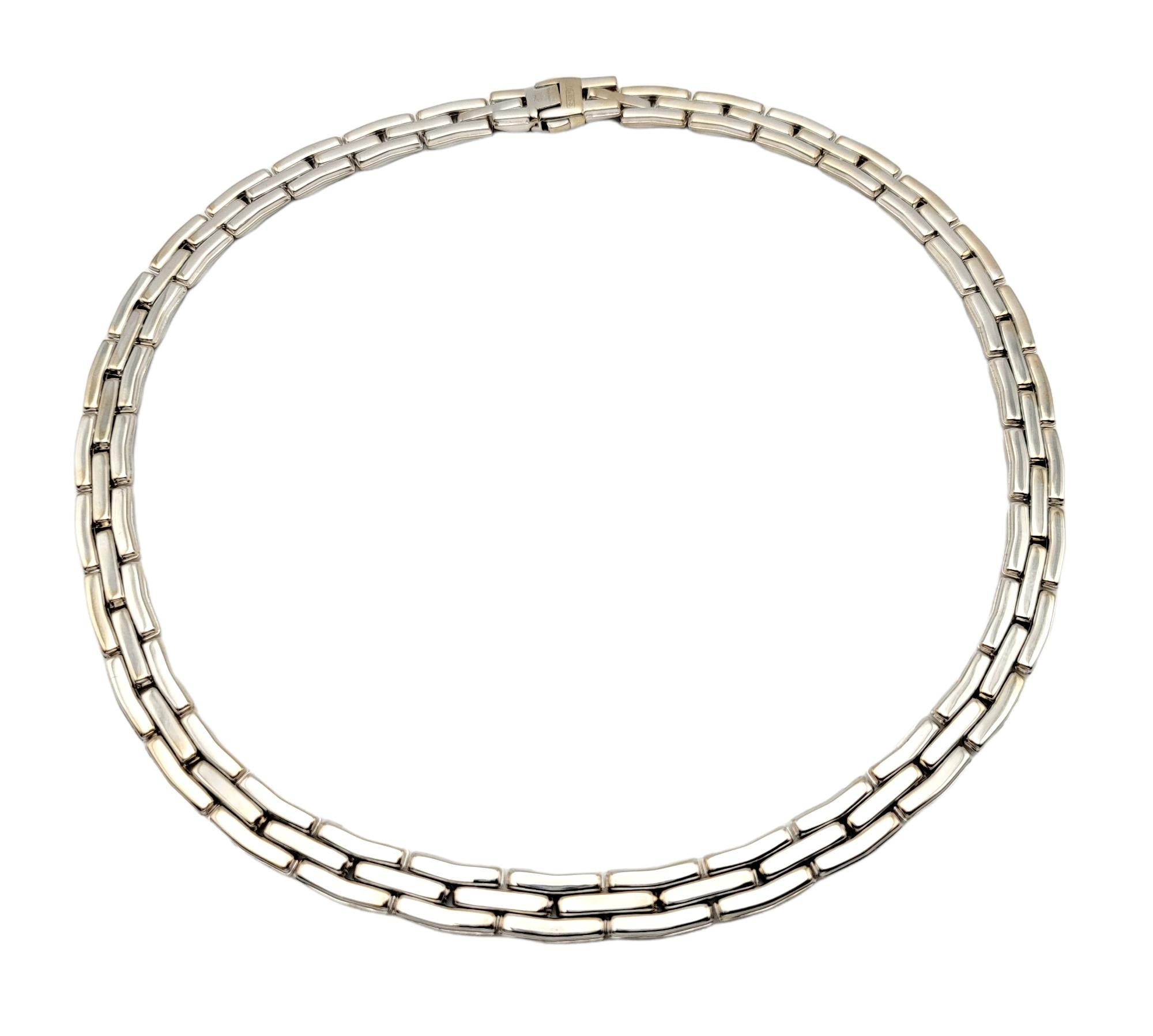You will absolutely love this strikingly beautiful minimalist necklace by Chimento. It is stunningly simple in design, with curved lines and glittering pave diamonds, making the piece absolutely glow! This lovely necklace features three rows of