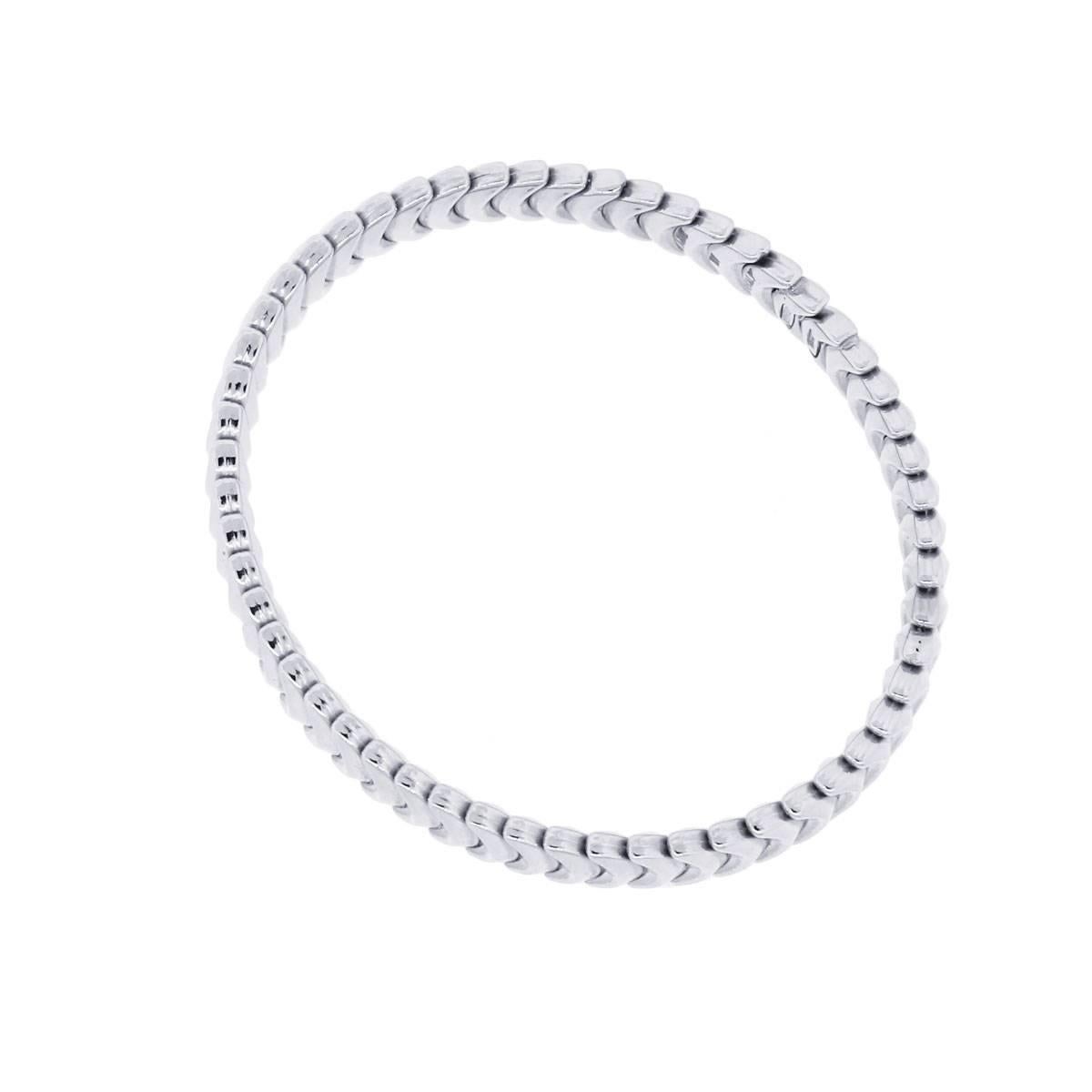Designer: Chimento
Material: 18k White Gold
Fastening: Open clasp
Measurements: Will fit a 6.25″ wrist
Item Weight: 11.5g (7.4dwt)
Additional Details: This item comes complete with a presentation box!
SKU: G7570

